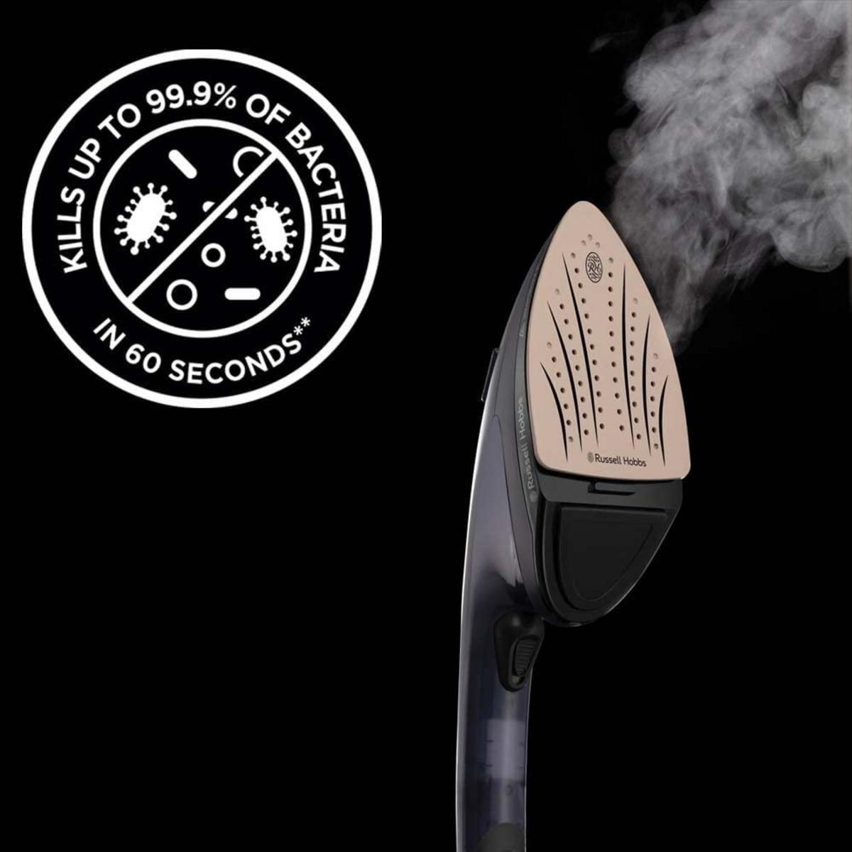 Czarne żelazko z parą. Tekst: Zabija do 99,9% bakterii w 60 sekund.