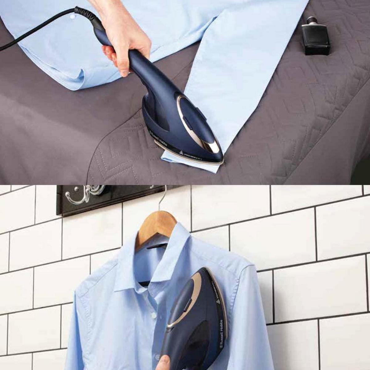 Żelazko używane na koszuli i wiszące na ścianie. Widoczna butelka perfum.