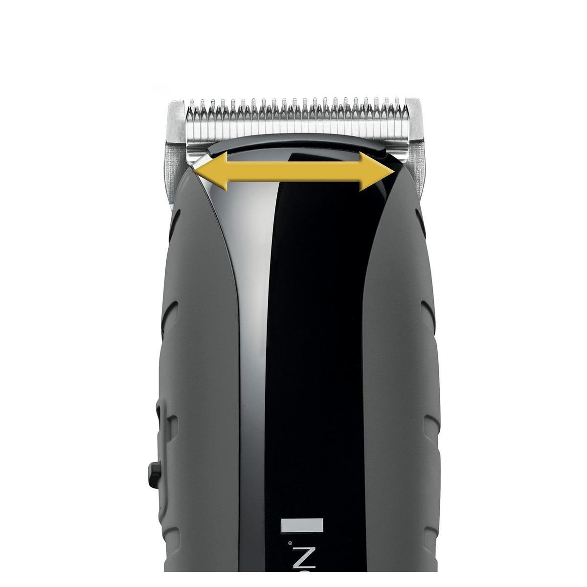 Primer plano de una cortadora de cabello negra y gris con una flecha que muestra la longitud de corte.