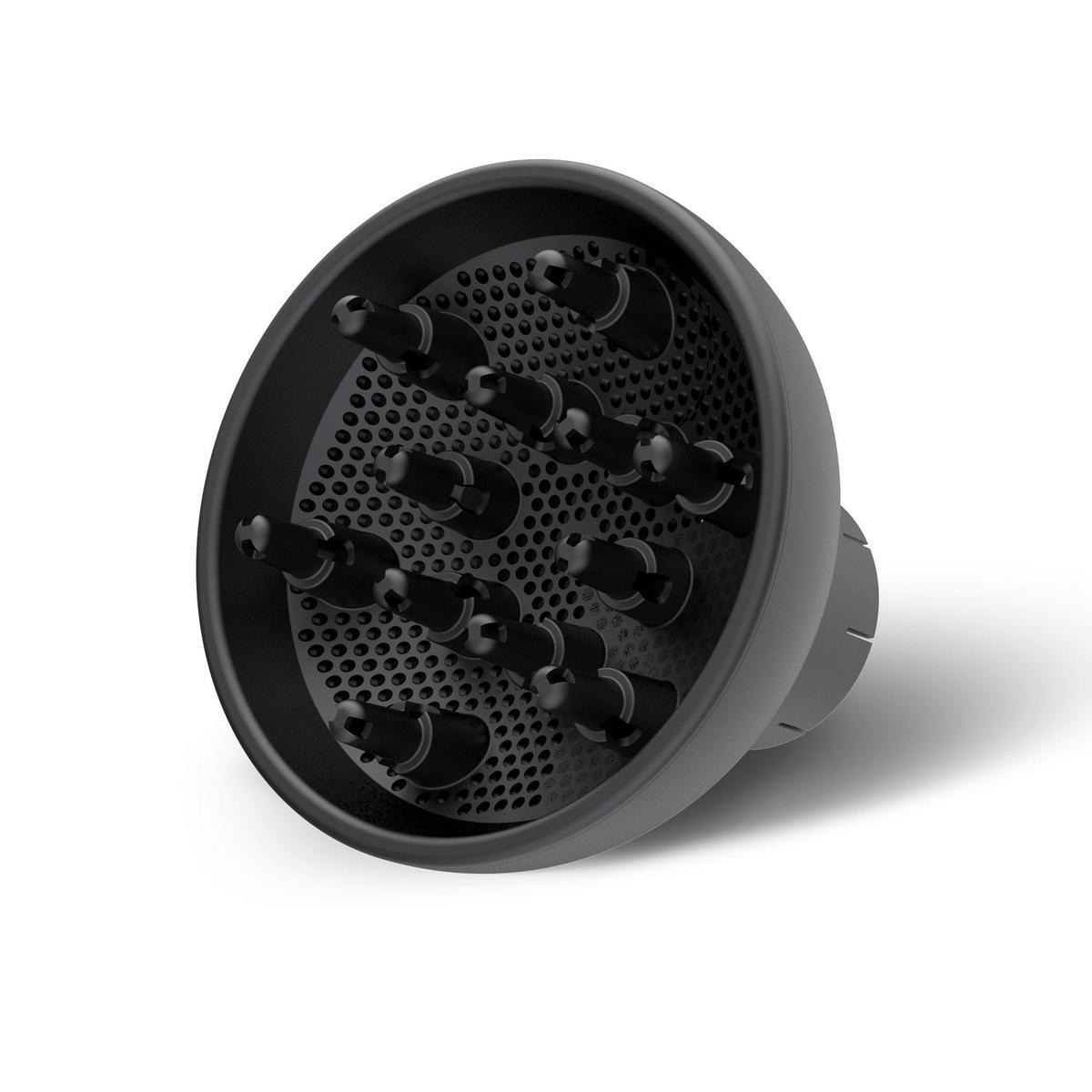 Czarny dyfuzor do suszarki do włosów, z licznymi kolcami i otworami, na białym tle.