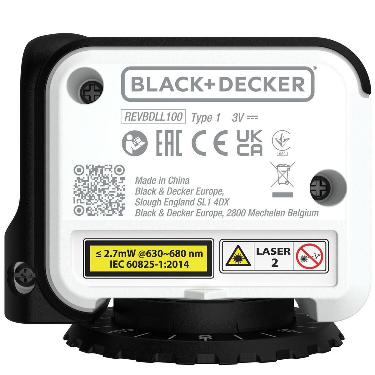 Dispositivo láser blanco y negro con etiquetas de advertencia. Tiene un dial circular en la base.