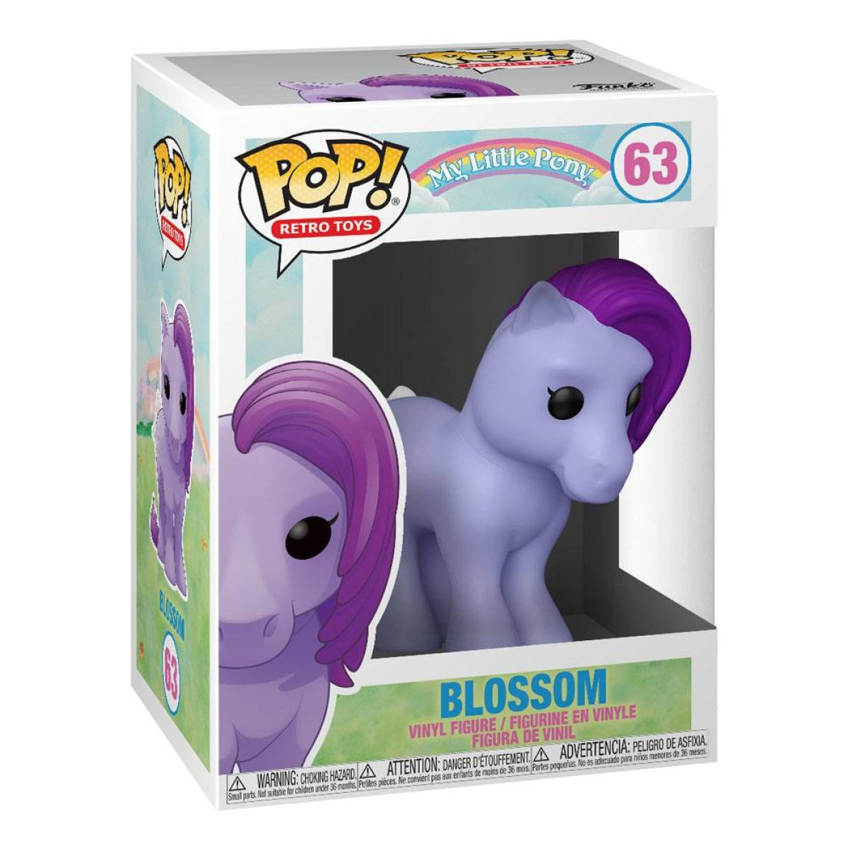 Ein My Little Pony Spielzeug, Blossom, in einer Box. Das Pony ist lila, die Box ist bunt mit Text.