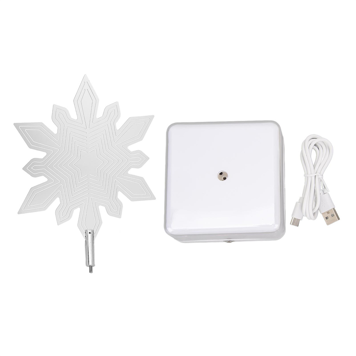 Weiße schneeförmige Dekoration mit Sockel und USB-Kabel. Alle Komponenten sind weiß.