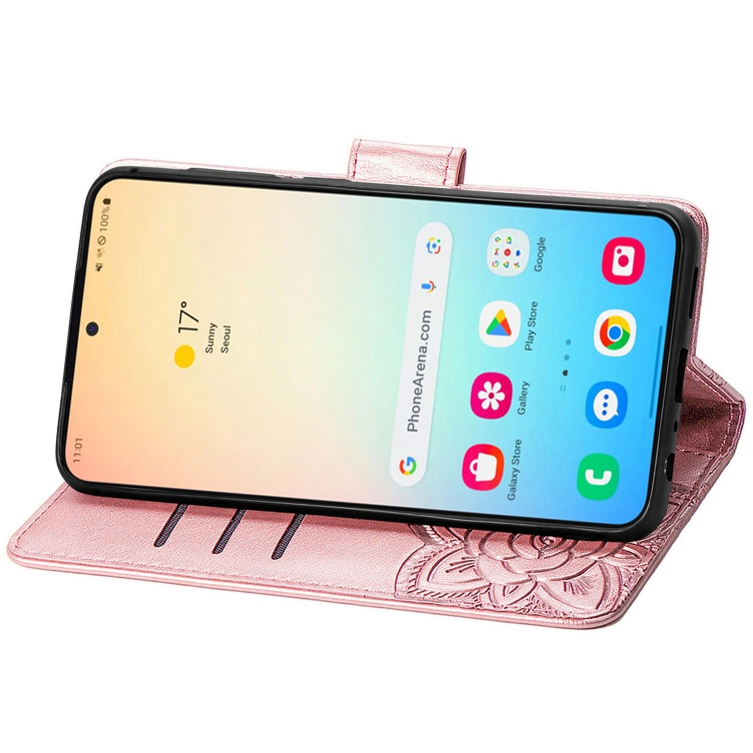 Rosa Handyhülle auf einem Telefon, geöffnet, um den Bildschirm anzuzeigen. Das Telefon zeigt Apps und die Uhrzeit an.