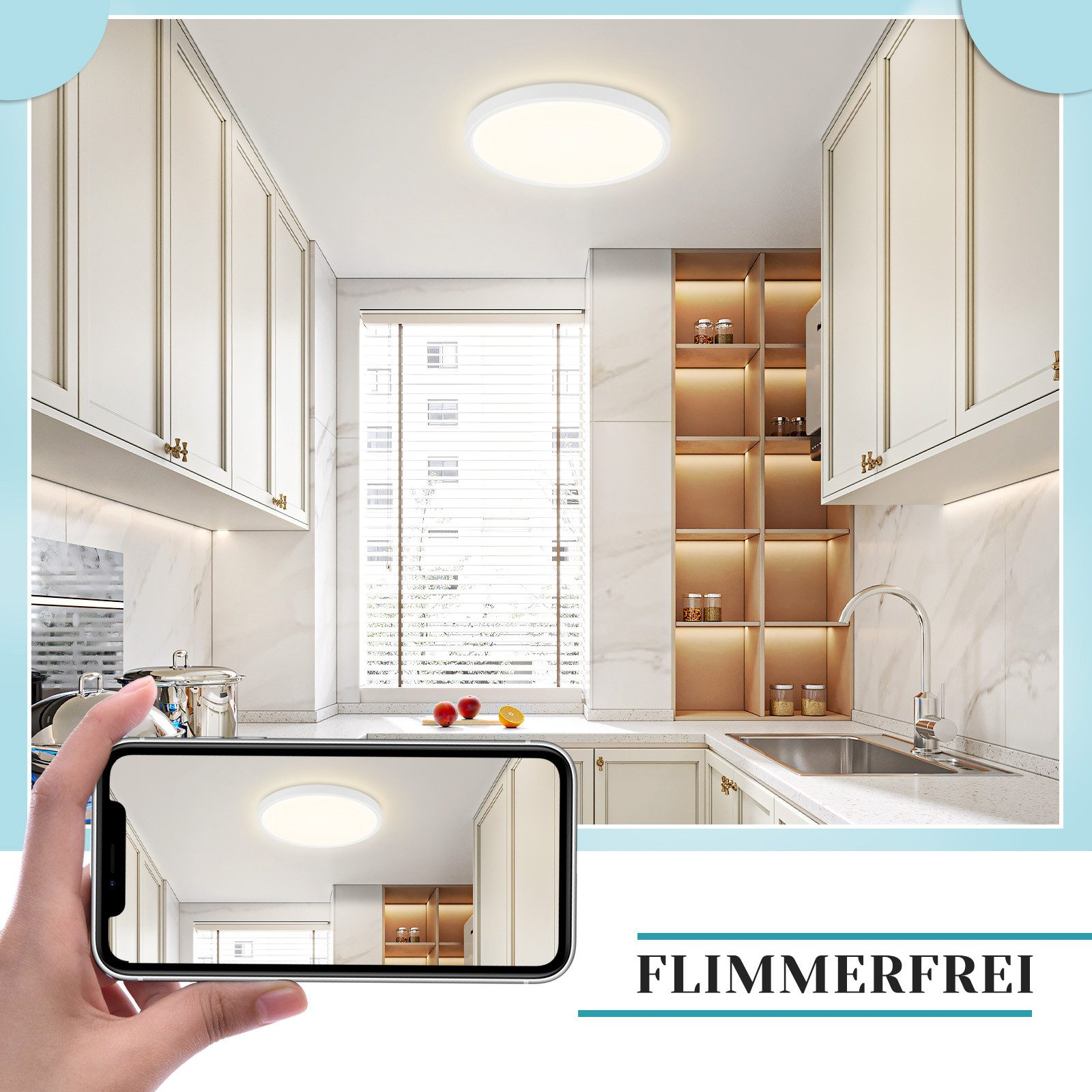 Una scena di cucina con una luce a soffitto brillante e un telefono che mostra la stessa luce. Armadi bianchi.