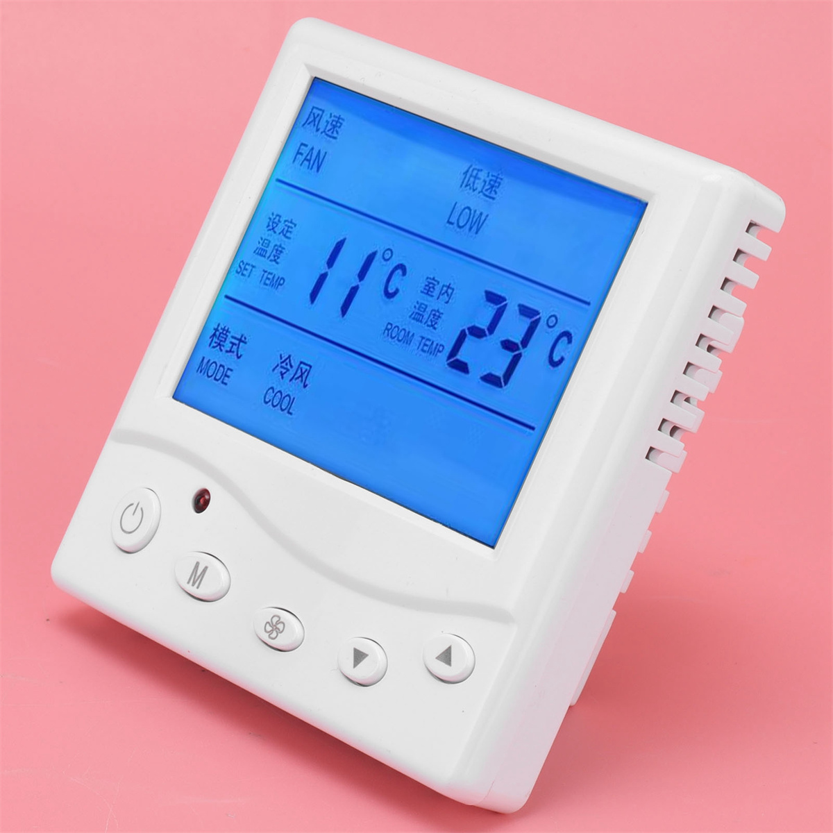 Weißer Thermostat mit blauem Bildschirm, der 11°C Soll- und 23°C Raumtemperatur anzeigt. Knöpfe unten.