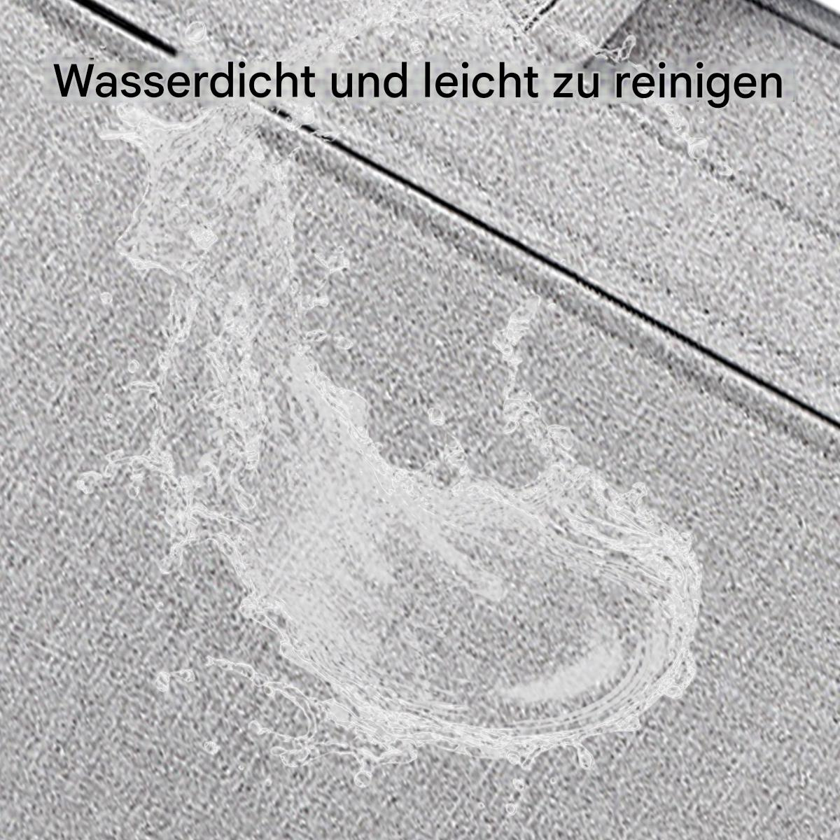 Nahaufnahme eines grauen Stoffes mit Wassertropfen, der Wasserbeständigkeit und einfache Reinigung zeigt.