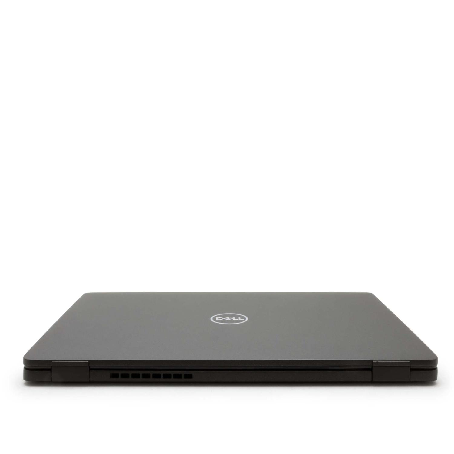 Ein geschlossener schwarzer Laptop auf einer weißen Oberfläche. Das Dell-Logo ist sichtbar.