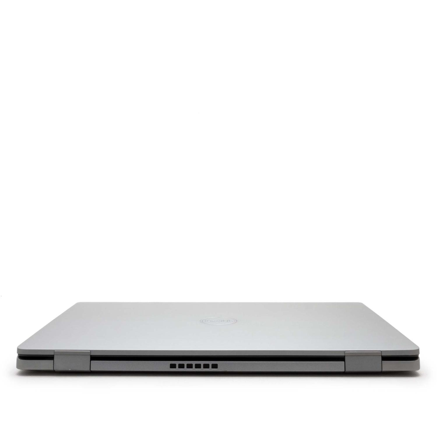 Ein silberner Dell-Laptop von oben. Der Laptop ist geschlossen und das Dell-Logo ist sichtbar.