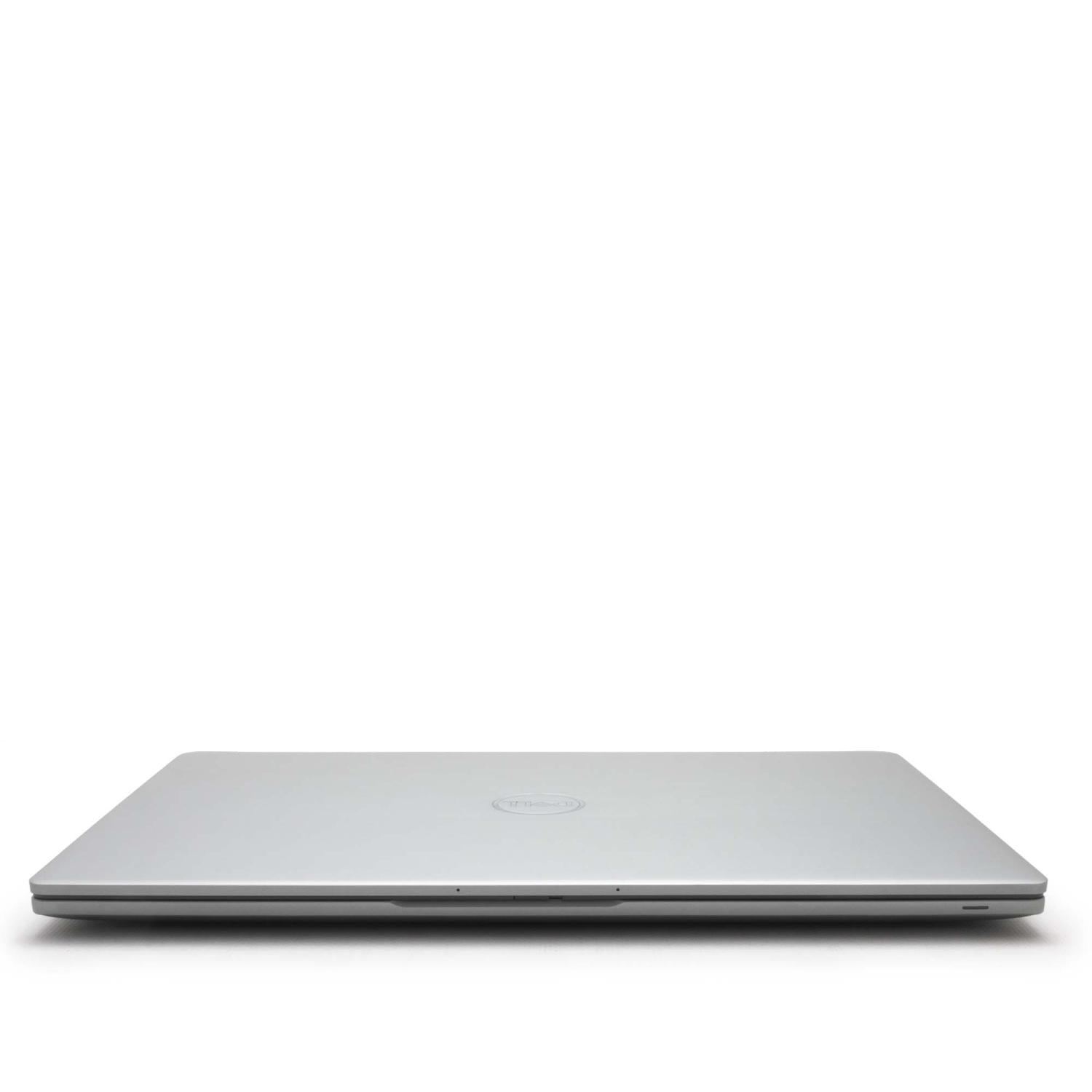 Geschlossener silberner Laptop, Draufsicht. Der Laptop liegt auf einer weißen Oberfläche.