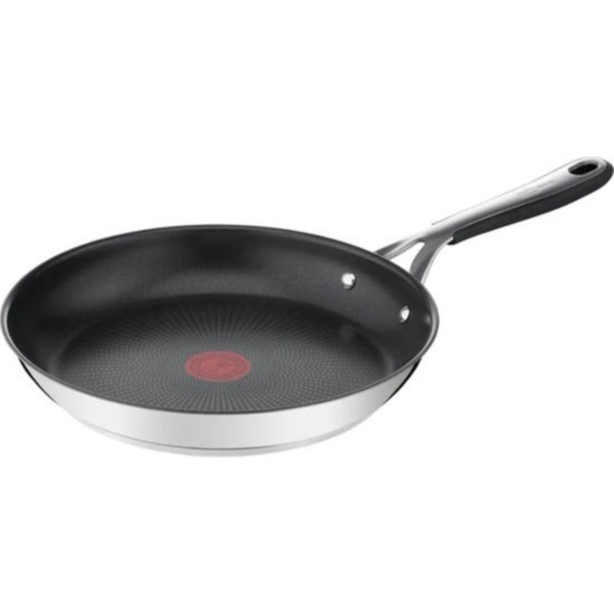 Silver and black frying pan with a red spot in the center. Handle facing right.