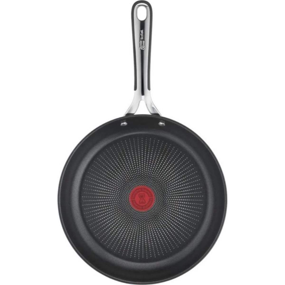 Black frying pan with a red center and concentric circles on the cooking surface.