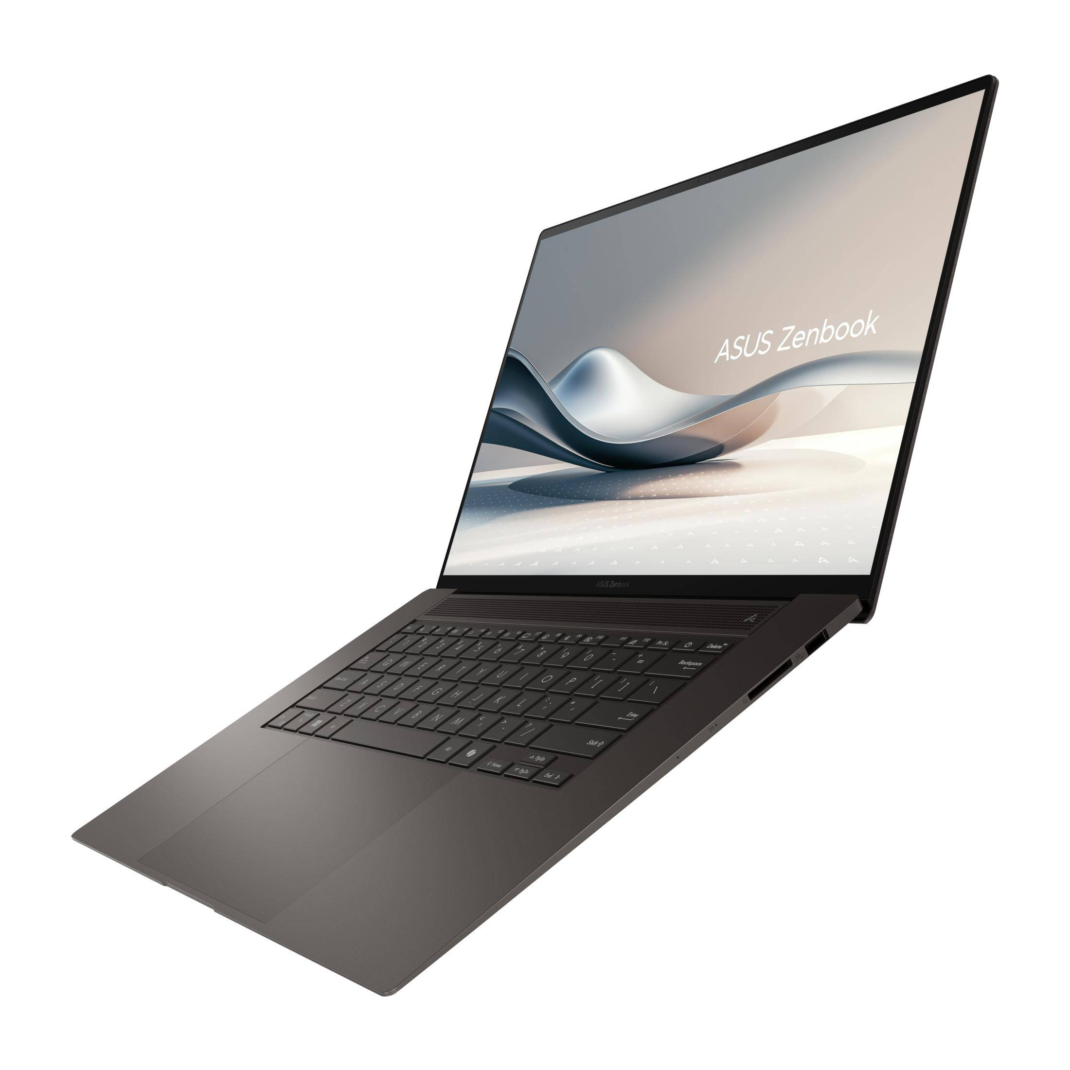 Laptop auf weißer Oberfläche. ASUS Zenbook Laptop, offen, mit Landschaft auf dem Bildschirm.