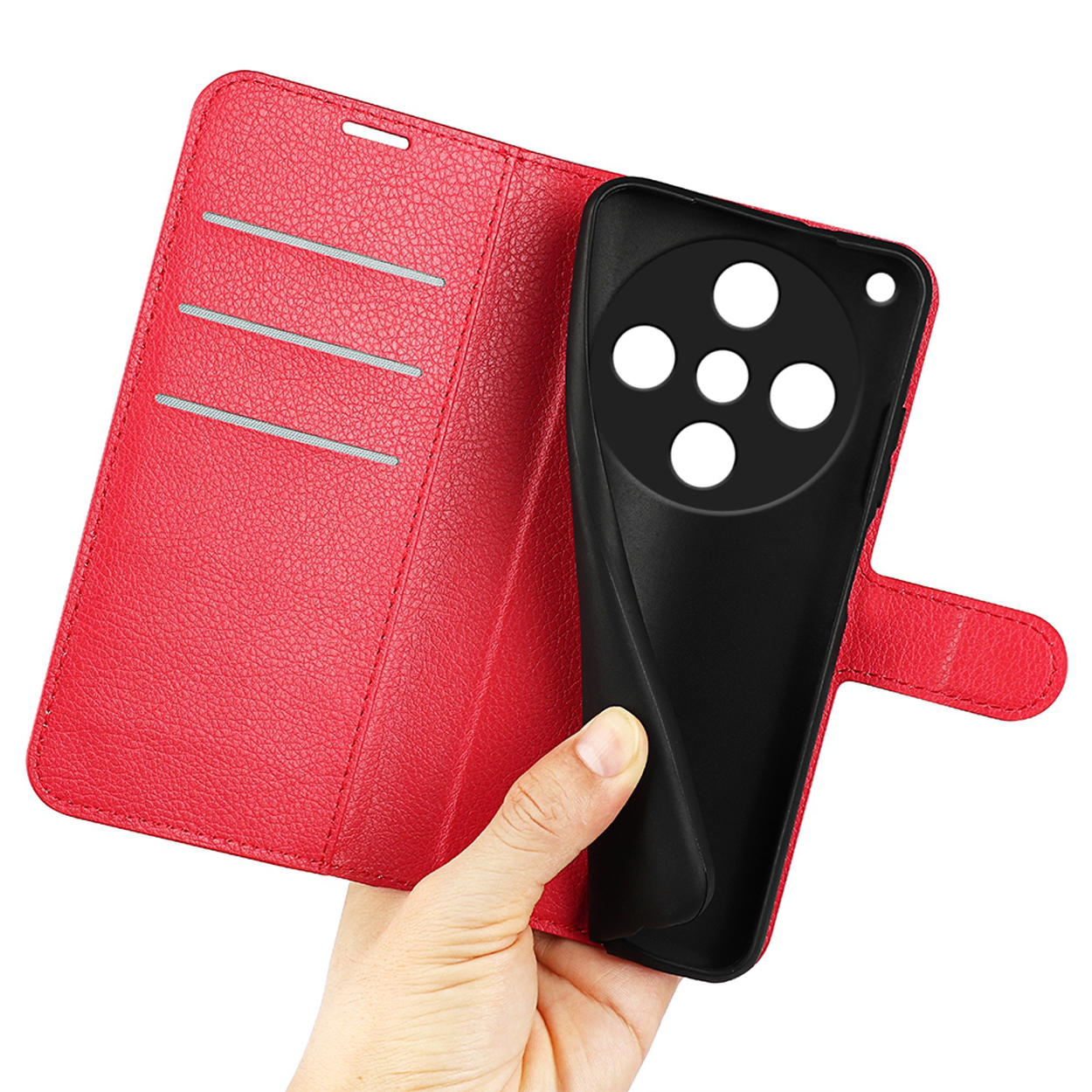 Étui de téléphone rouge, ouvert. Une main tient l'étui noir à l'intérieur.
