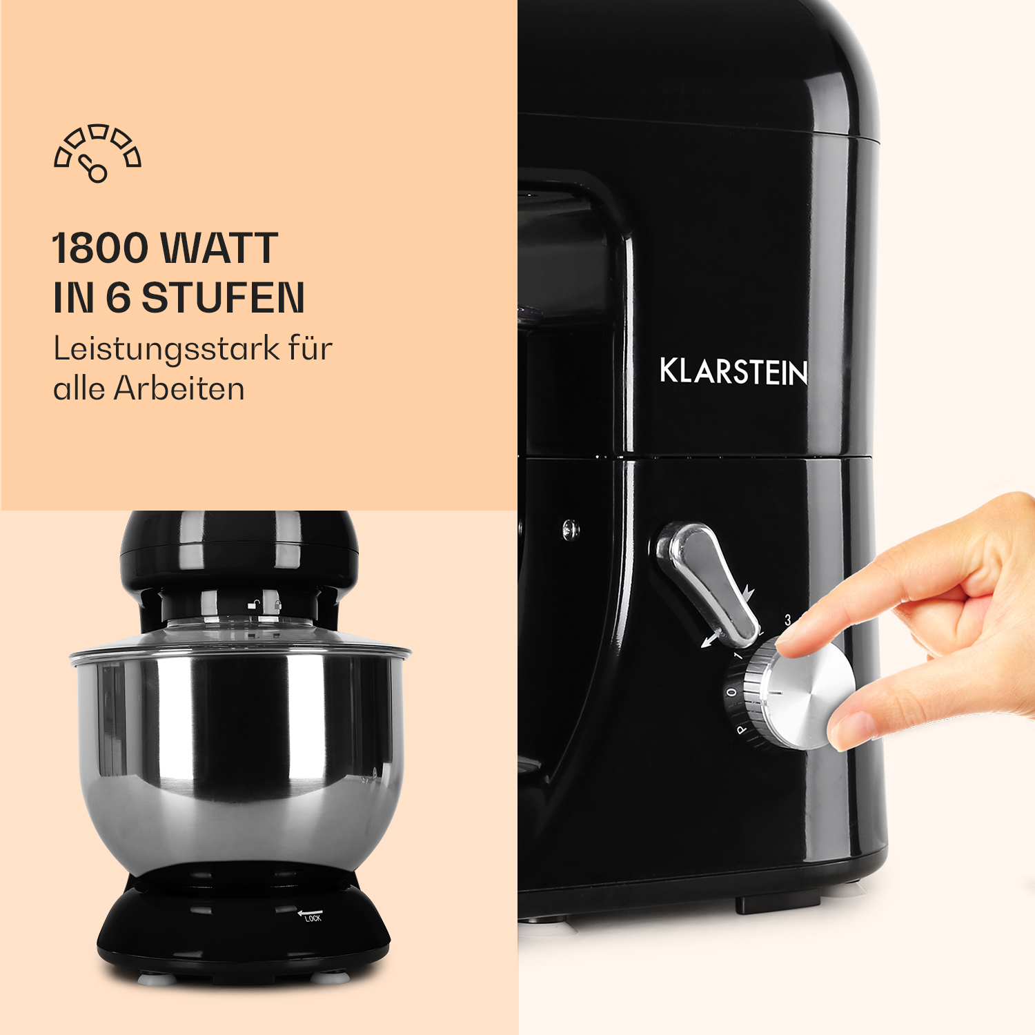 Schwarze Küchenmaschine mit Edelstahl-Schüssel, Hand dreht einen Drehregler.