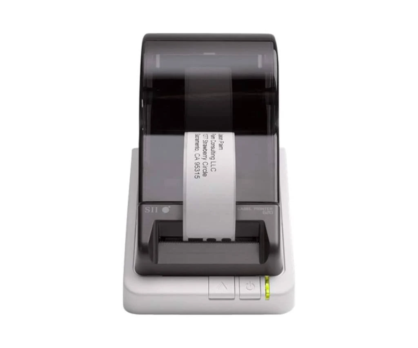 Label printer with a white label, gray base, and a black top; green power light is on.