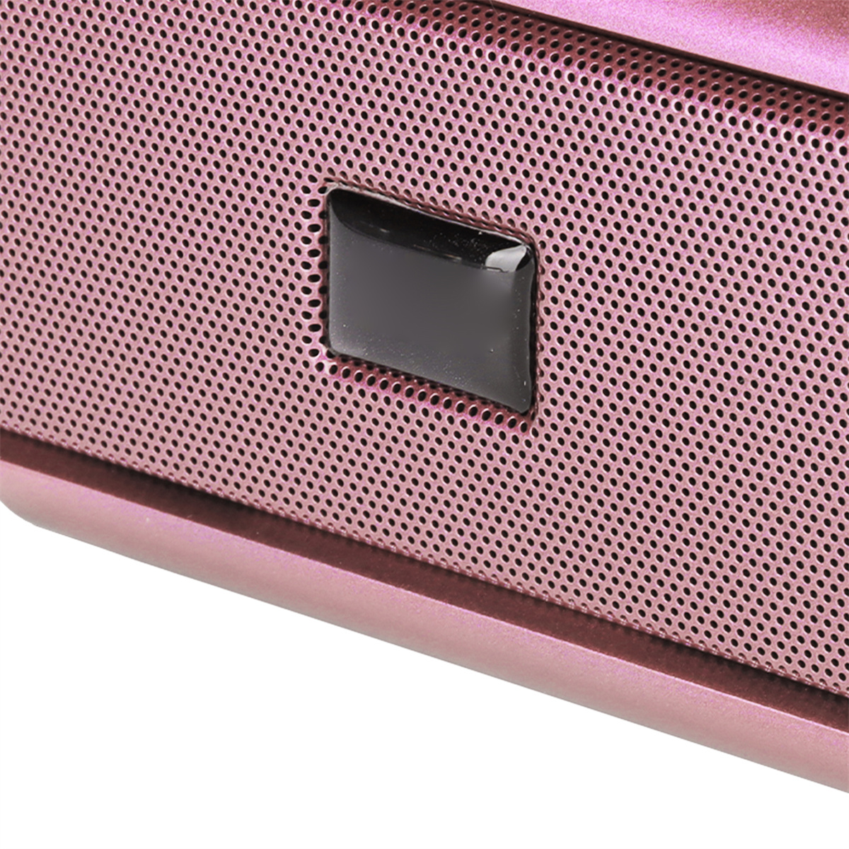 Nahaufnahme eines rosa Lautsprechers mit einem schwarzen Knopf in der Mitte.