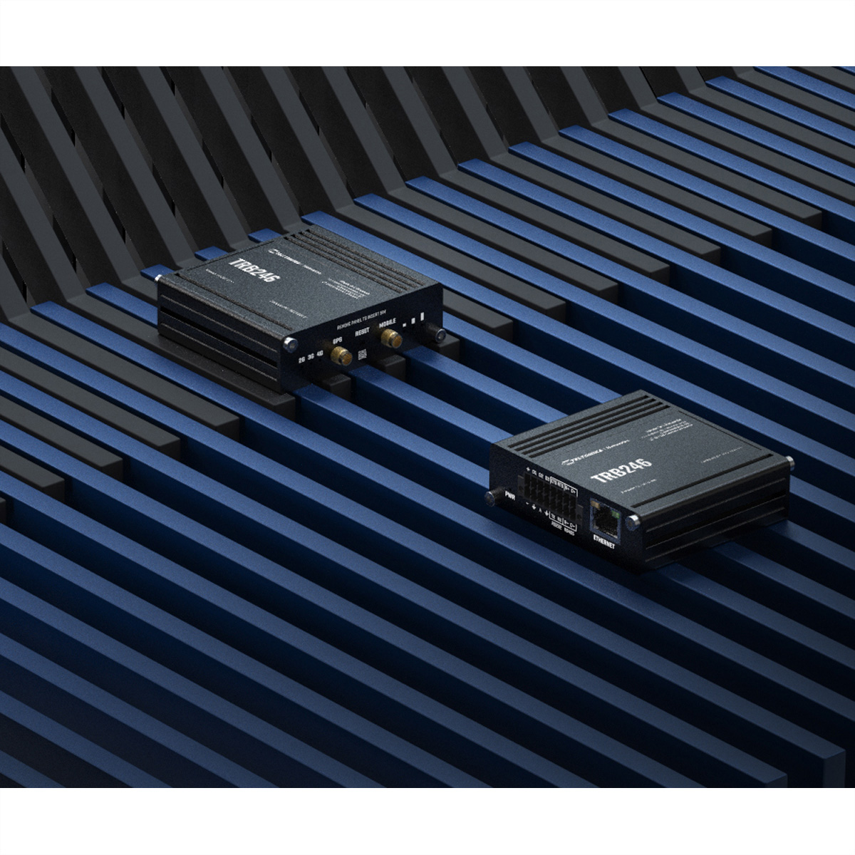Two black network devices on a blue abstract background. The devices have labels. Dark blue background.