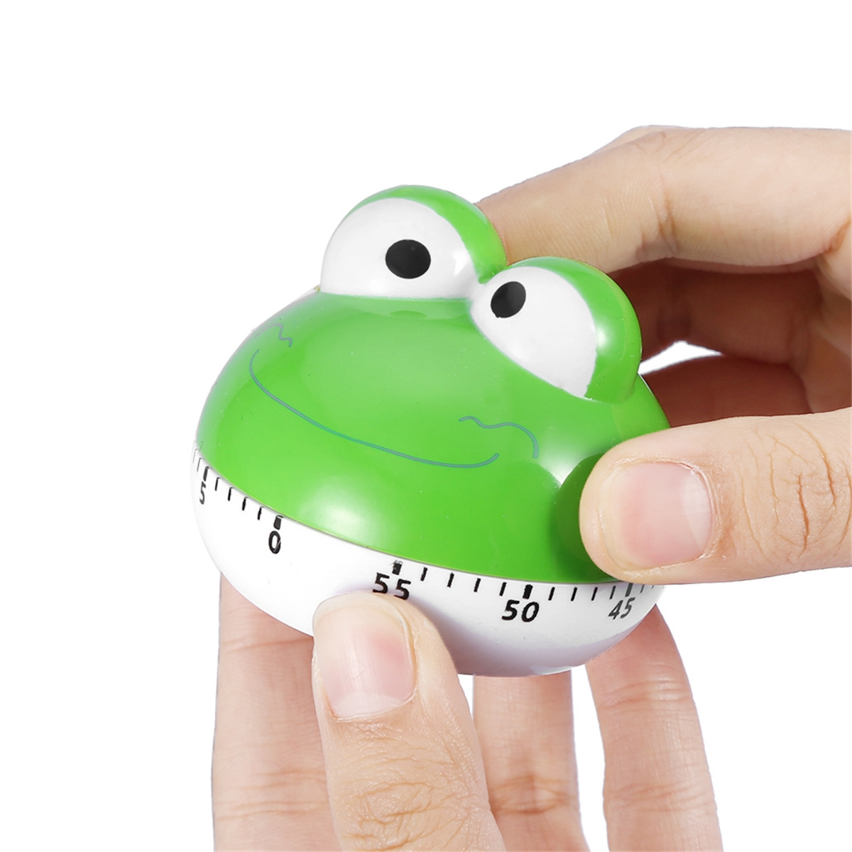 Ein grüner froschförmiger Küchentimer mit Zahlen und Zeigern.