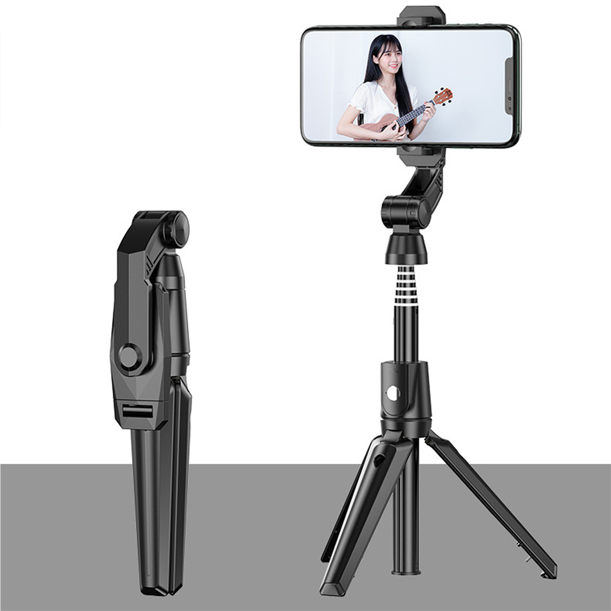 Schwarzer Selfie-Stick und Stativ. Eine Frau spielt Ukulele auf dem Handy-Bildschirm.