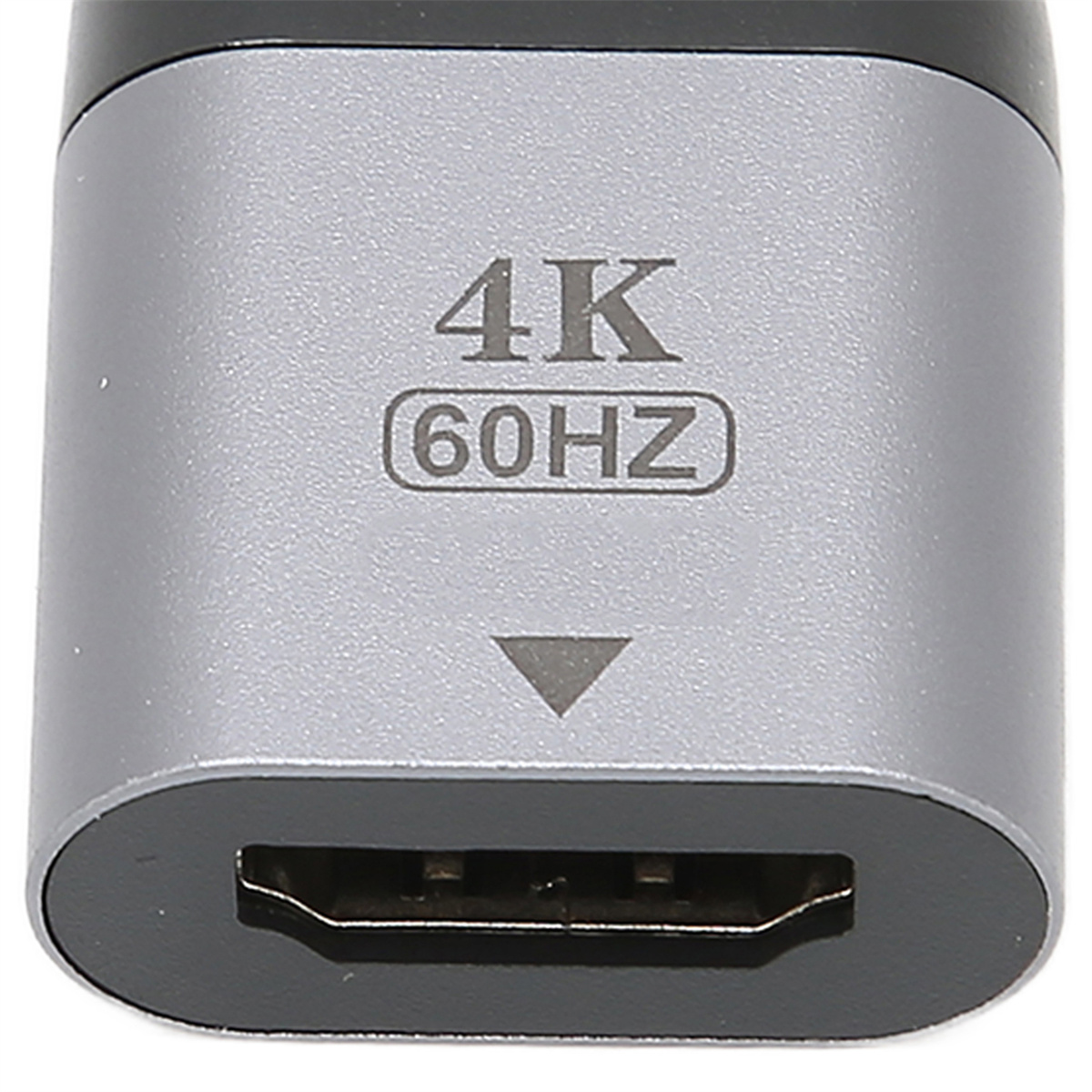 Silberner Adapter mit Text: 4K 60HZ und einem HDMI-Anschluss.