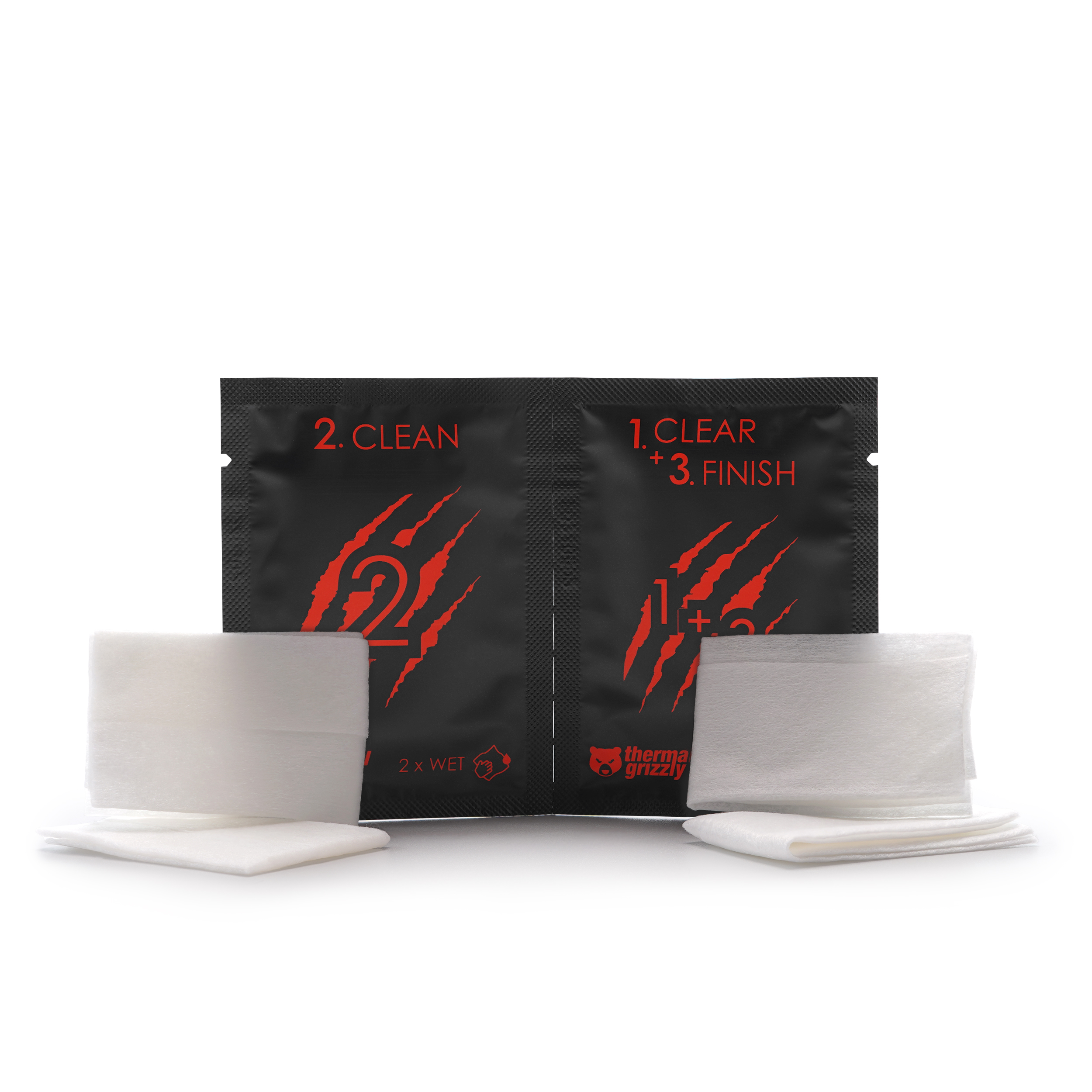 Deux tampons de nettoyage et deux lingettes nettoyantes sur fond blanc.