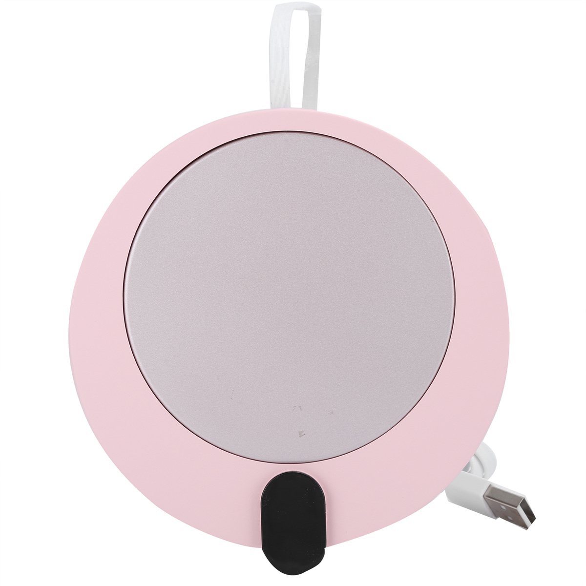 Ein rosa-grauer Untersetzer mit Ladekabel liegt auf weißem Untergrund.