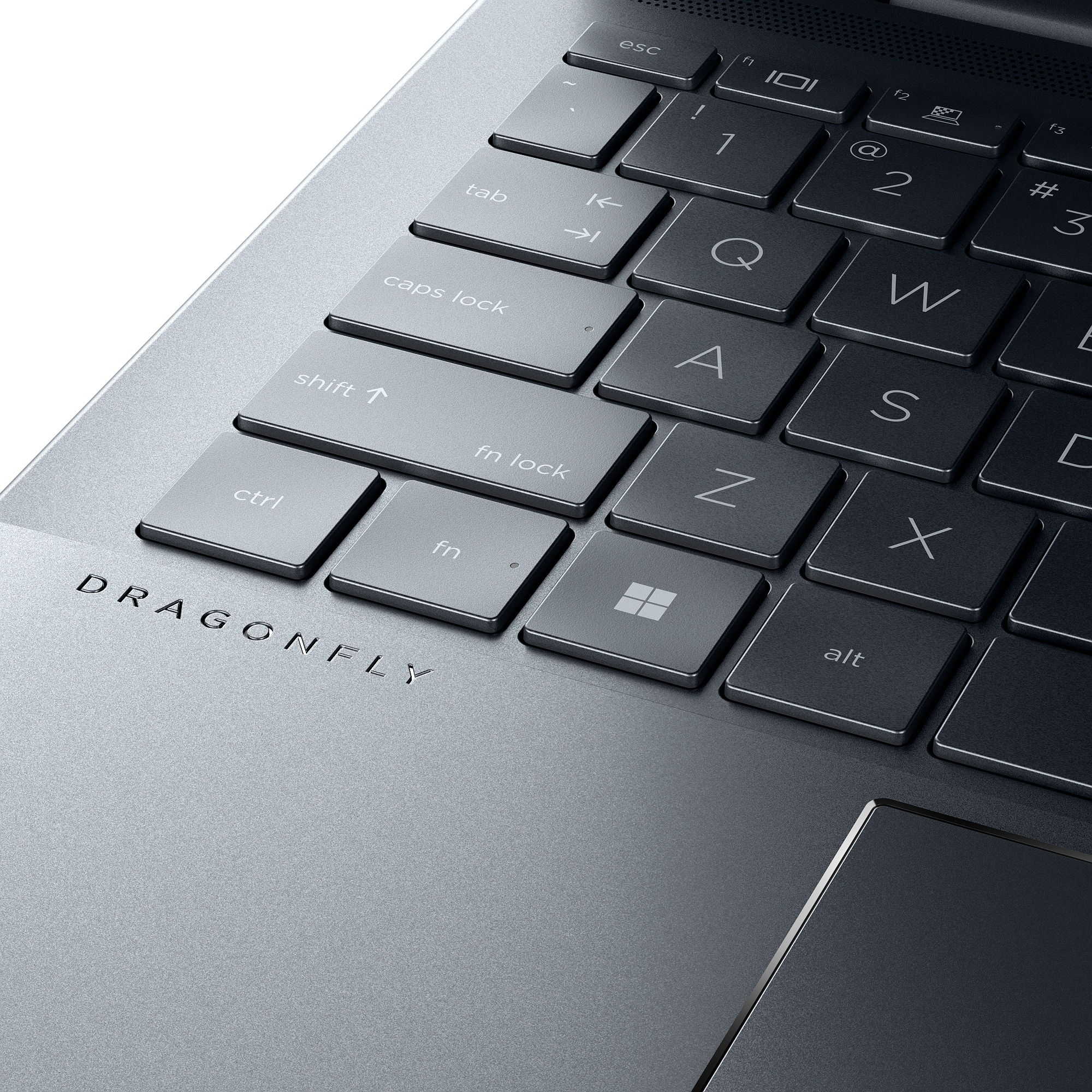 Primo piano di una tastiera di un laptop con la parola "DRAGONFLY" sotto i tasti. I tasti sono grigio scuro.