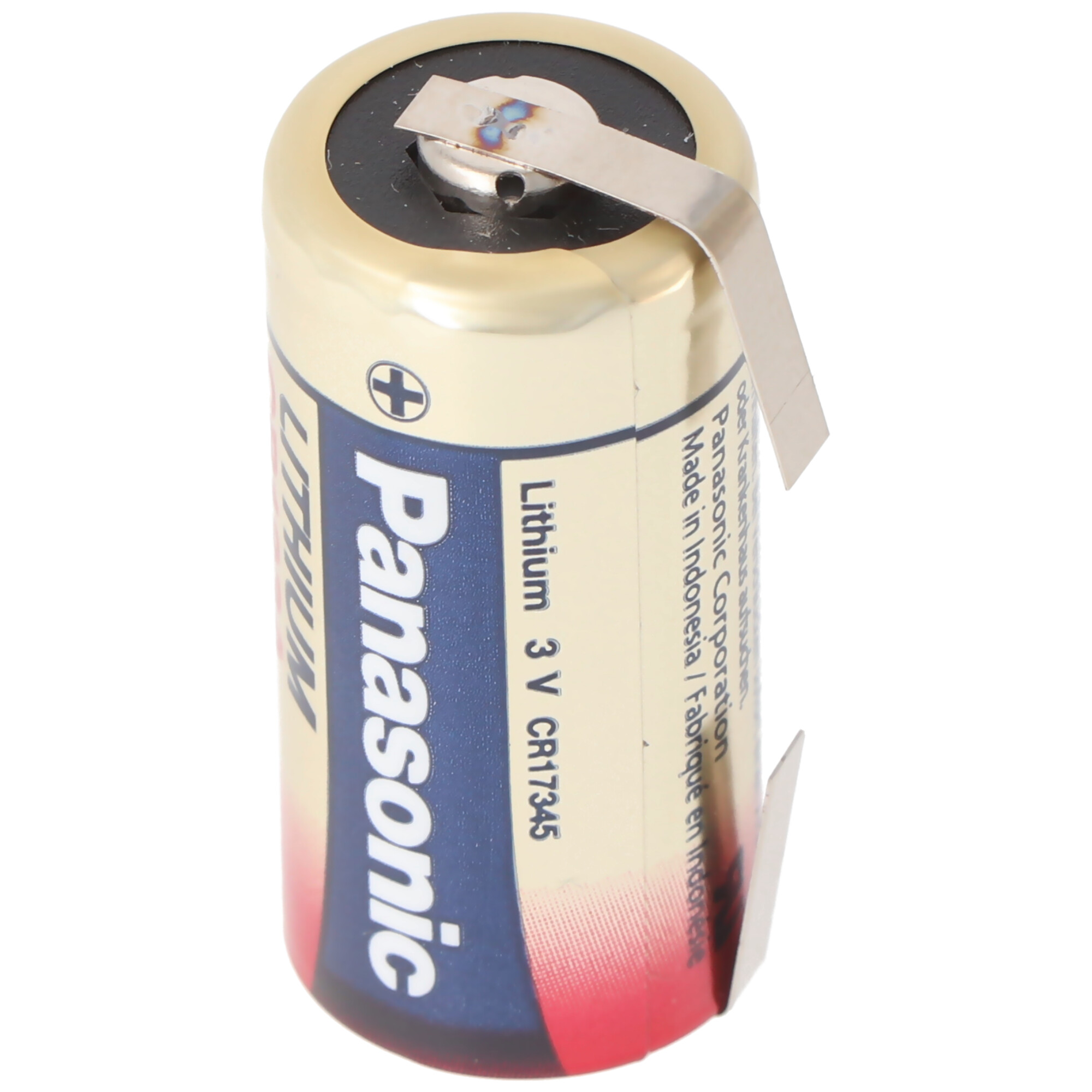 Een Panasonic Lithium 3V CR1735-batterij, metallic goud met blauwe en rode details.