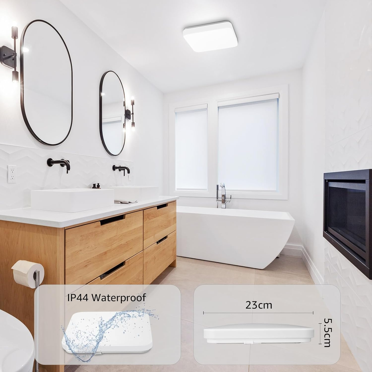 Ein Badezimmer mit weißer Badewanne, zwei Waschbecken und einem Licht. Ein IP44 wasserdichtes Licht wird gezeigt.