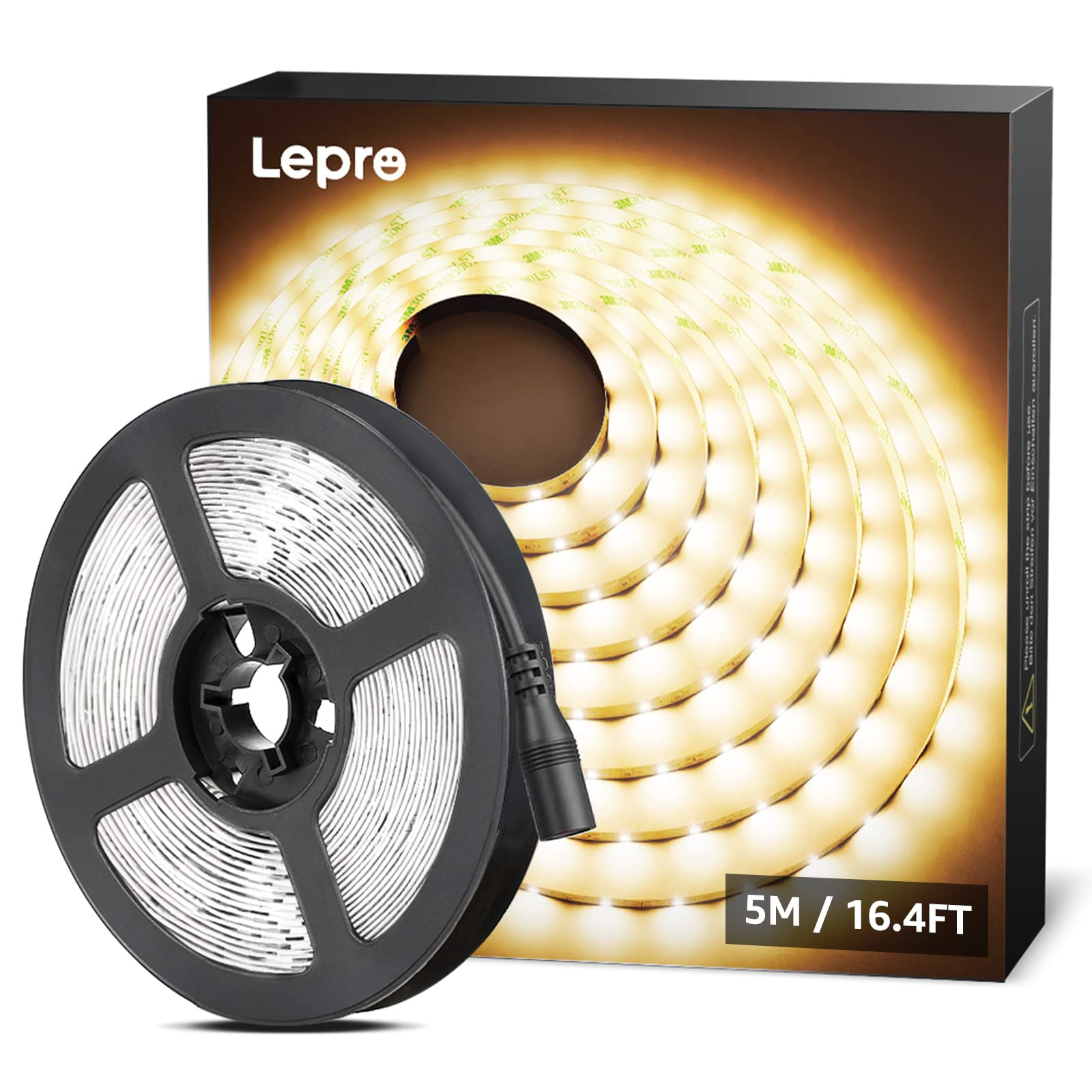 Eine schwarze Rolle LED-Streifenlichter in einer Box, die warmweißes Licht zeigen.