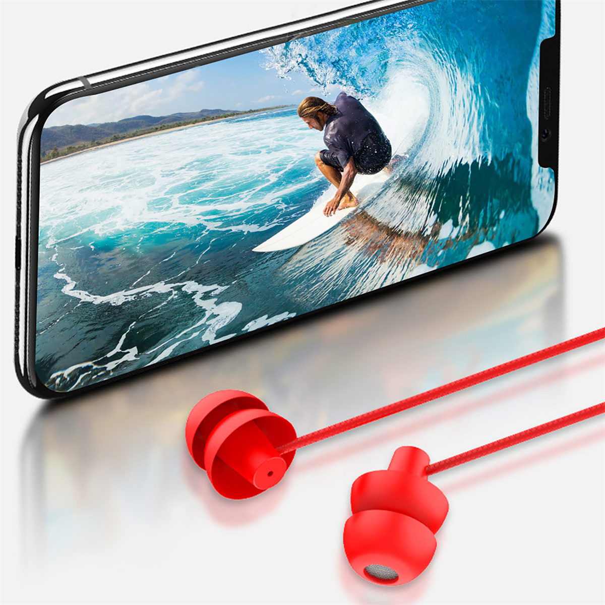 Telefon zeigt einen Surfer auf einer Welle, darunter rote Ohrhörer.