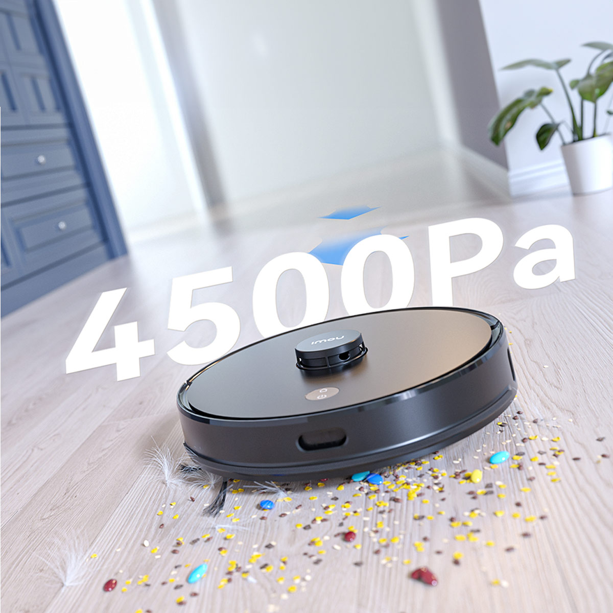 Ein schwarzer Roboter-Staubsauger auf einem Holzboden. Es gibt einige Trümmer und einen blauen Pfeil darüber.