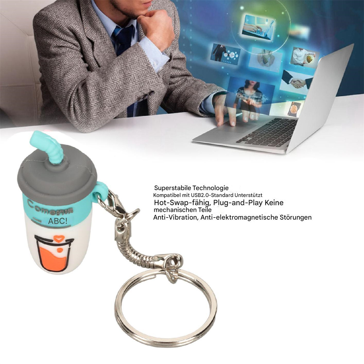 Ein Mann im Anzug benutzt einen Laptop mit einem Schlüsselanhänger im Getränkebecher-Design.