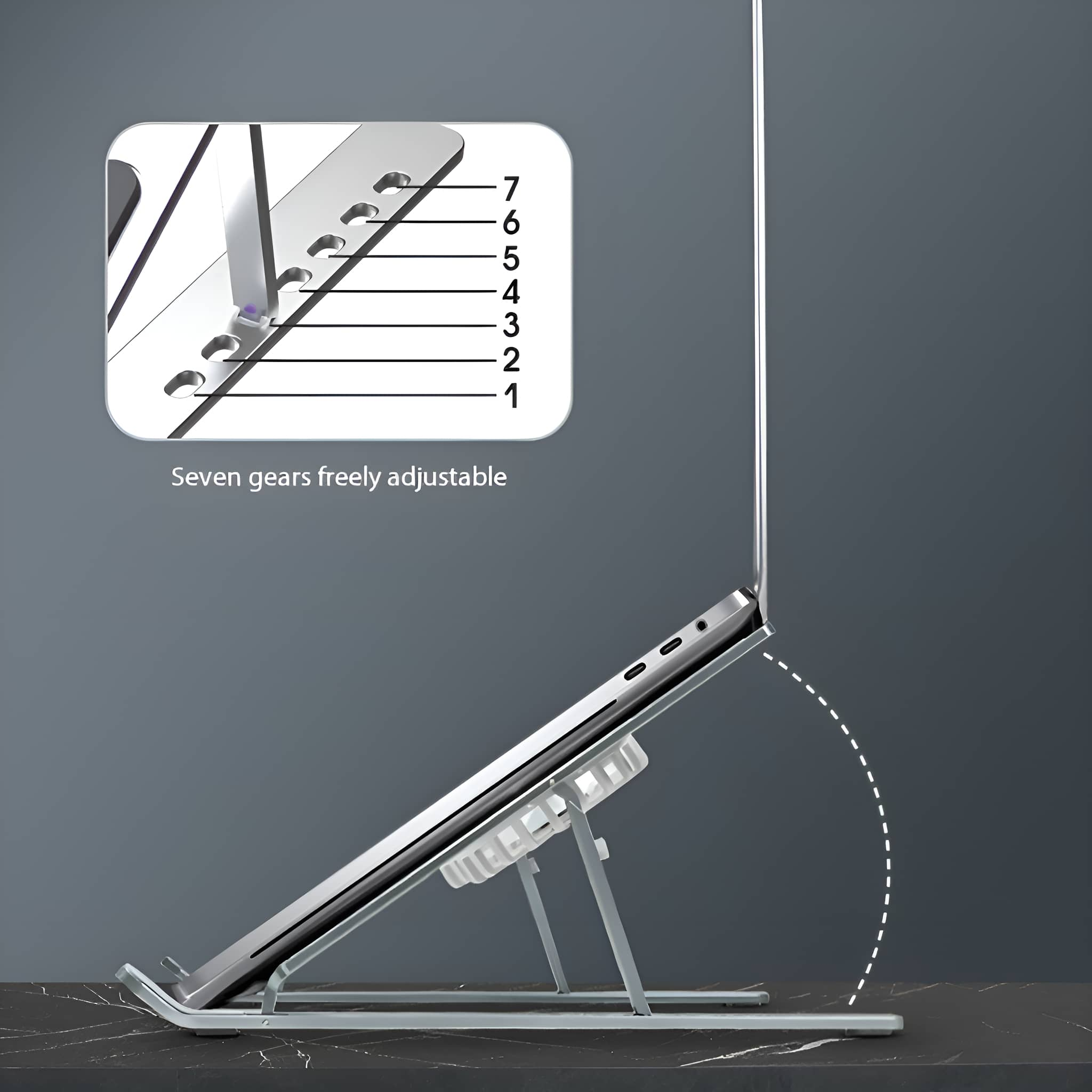 Laptop auf einem Ständer mit höhenverstellbarer Funktion. Gezoomte Ansicht zeigt die Gänge.