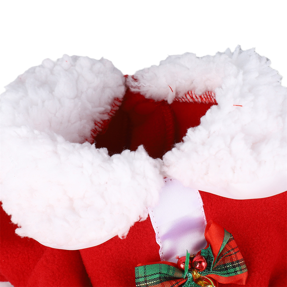 Nahaufnahme eines Weihnachtsmann-Stiefeloberteils mit weißem, flauschigem Besatz und roter Schleife.