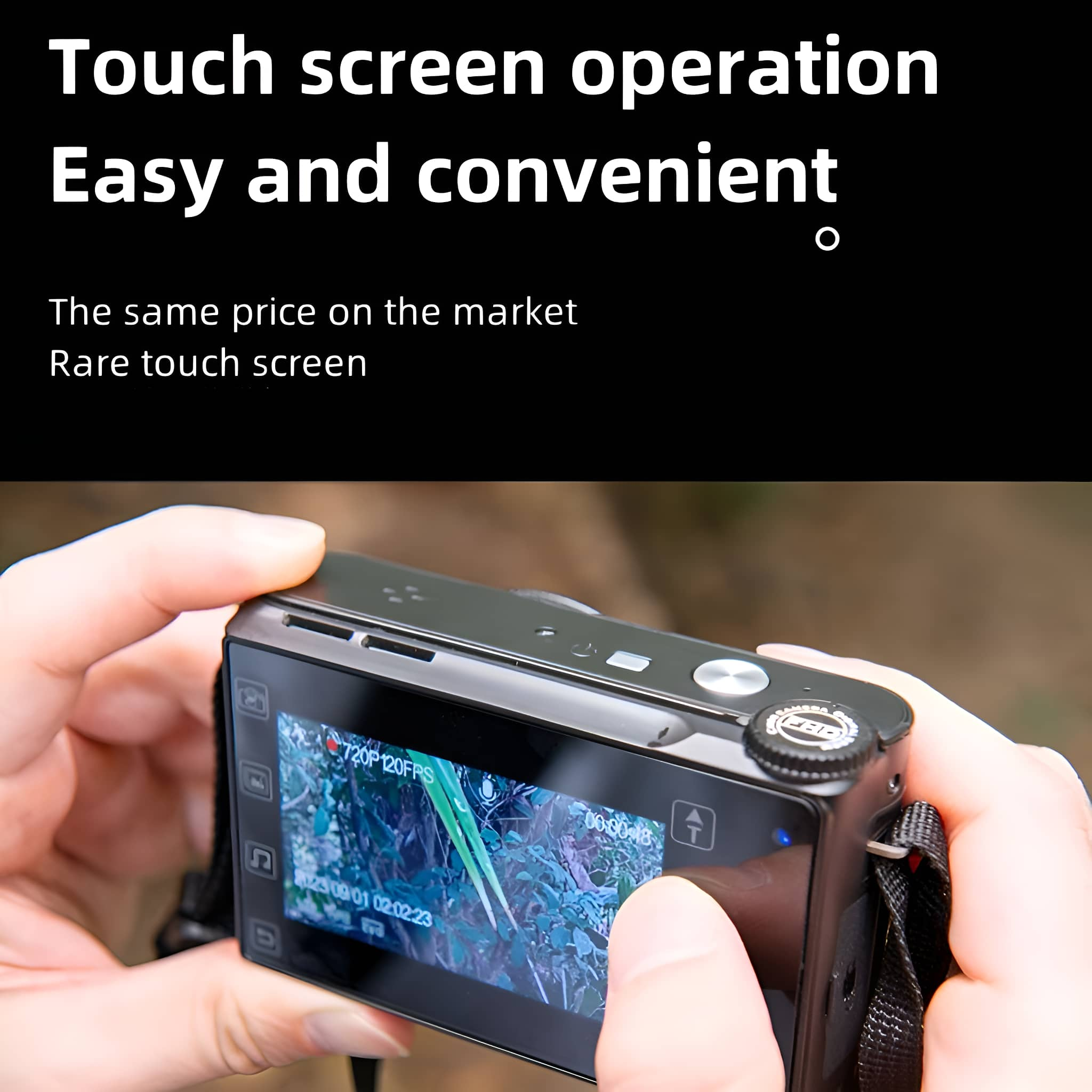 Hände, die eine schwarze Kamera mit Touchscreen halten, der Bildschirm zeigt eine grüne Szene.