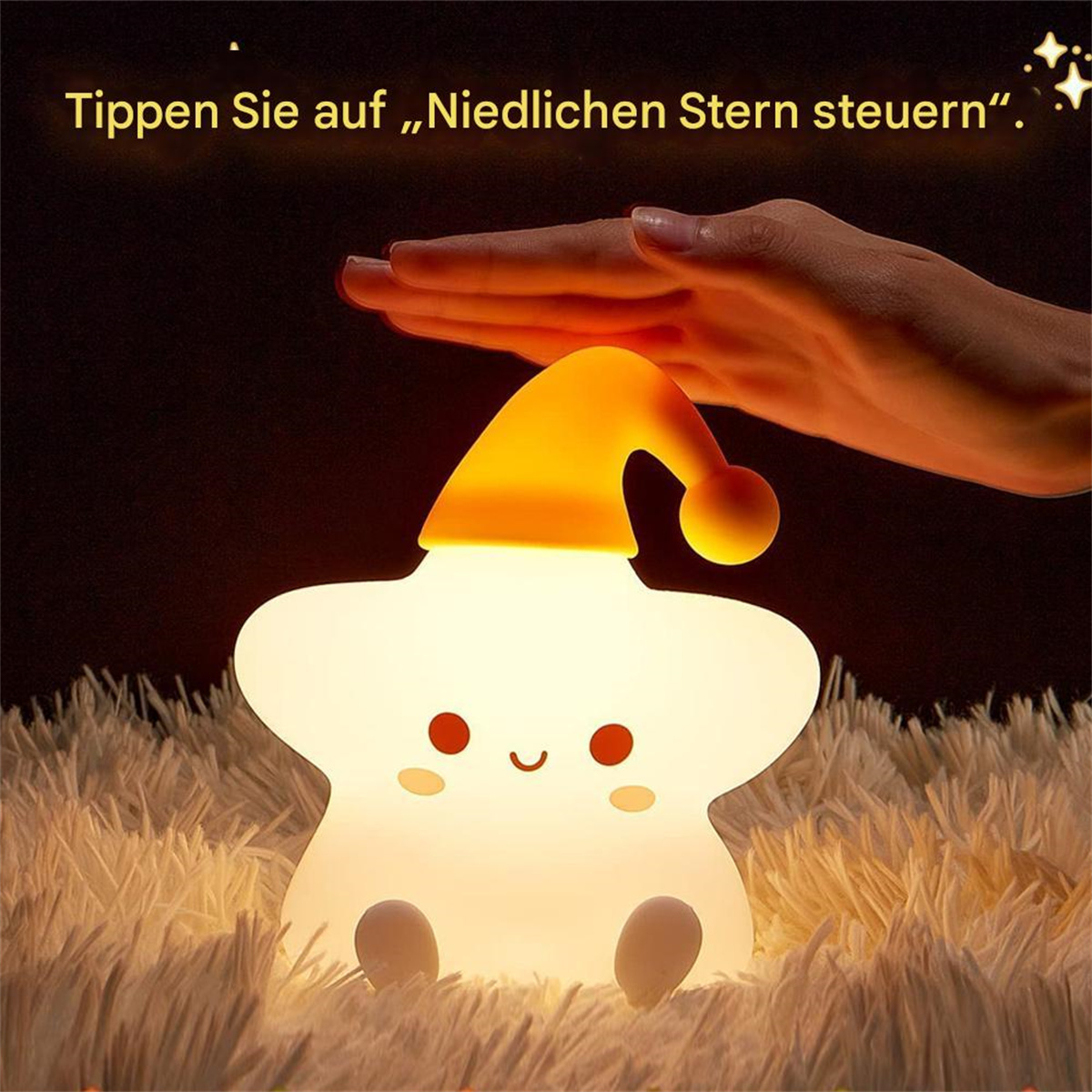 Ein sternförmiges Nachtlicht mit gelbem Hut, Hand zeigt darauf.