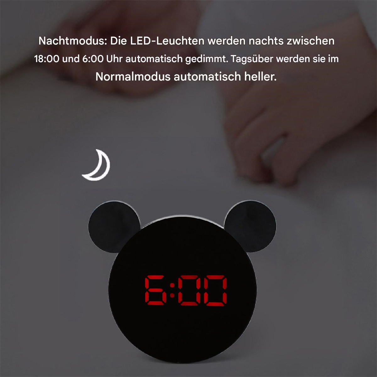 Ein schwarzer Wecker in Mickey-Mouse-Form mit roter Digitalanzeige.