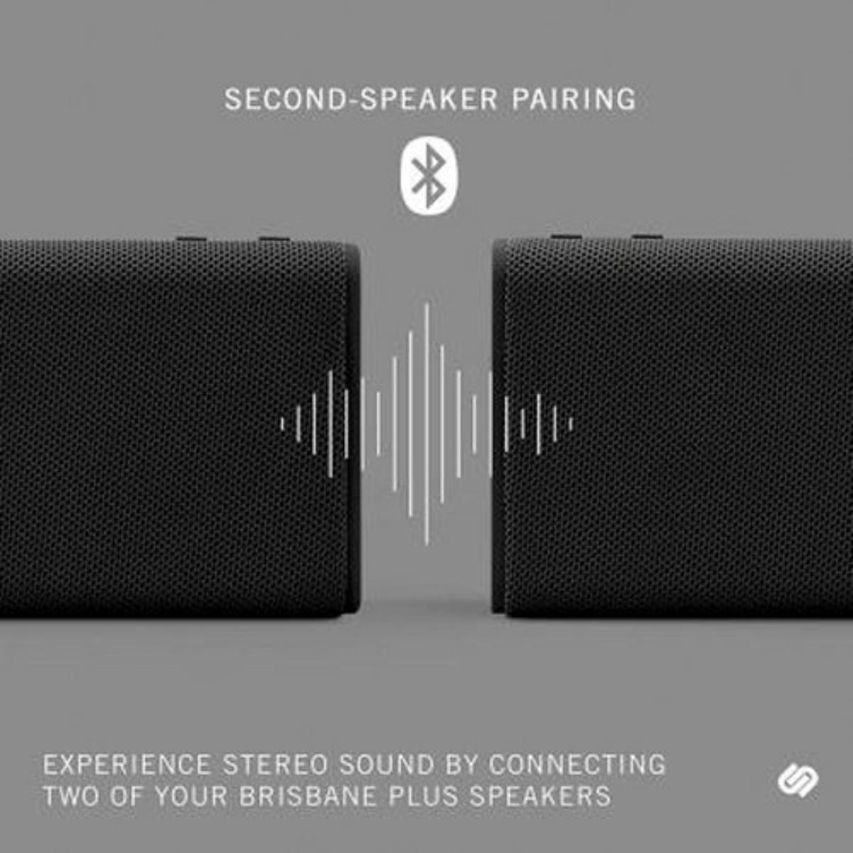 Deux haut-parleurs noirs avec les mots "SECOND-SPEAKER PAIRING" et le symbole Bluetooth.