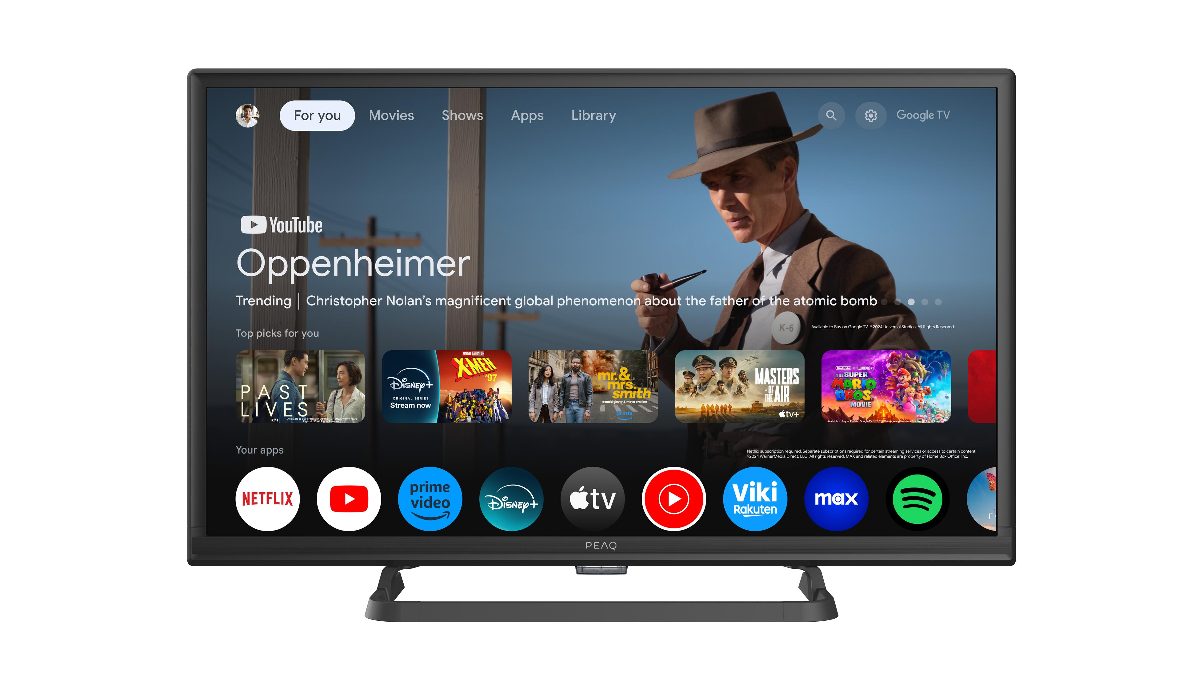 Ein Fernsehbildschirm zeigt die Google TV-Oberfläche. Es zeigt verschiedene Apps und ein Filmplakat.
