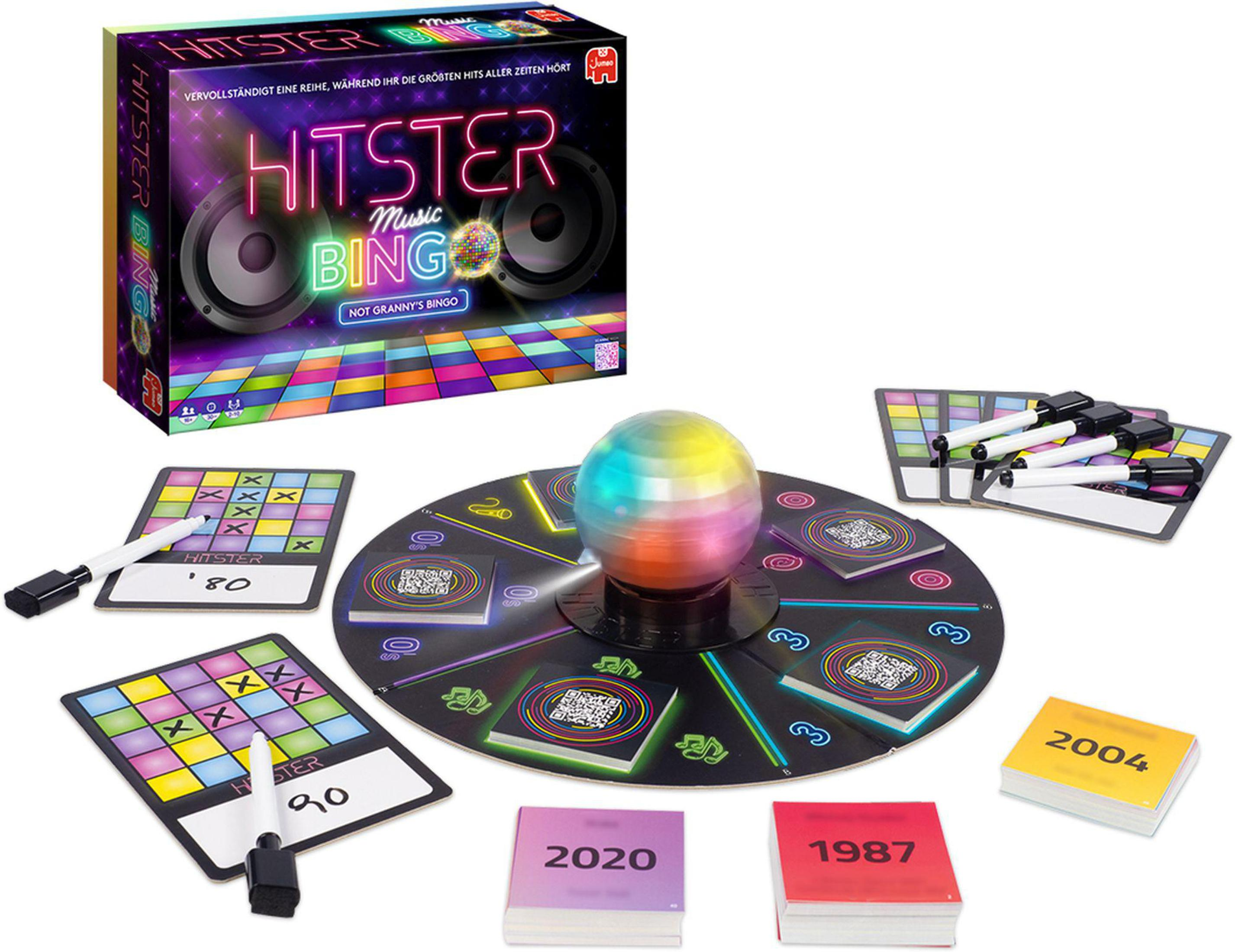 Un gioco da tavolo con una palla da discoteca al centro. Carte e tabelloni di bingo sono visibili.
