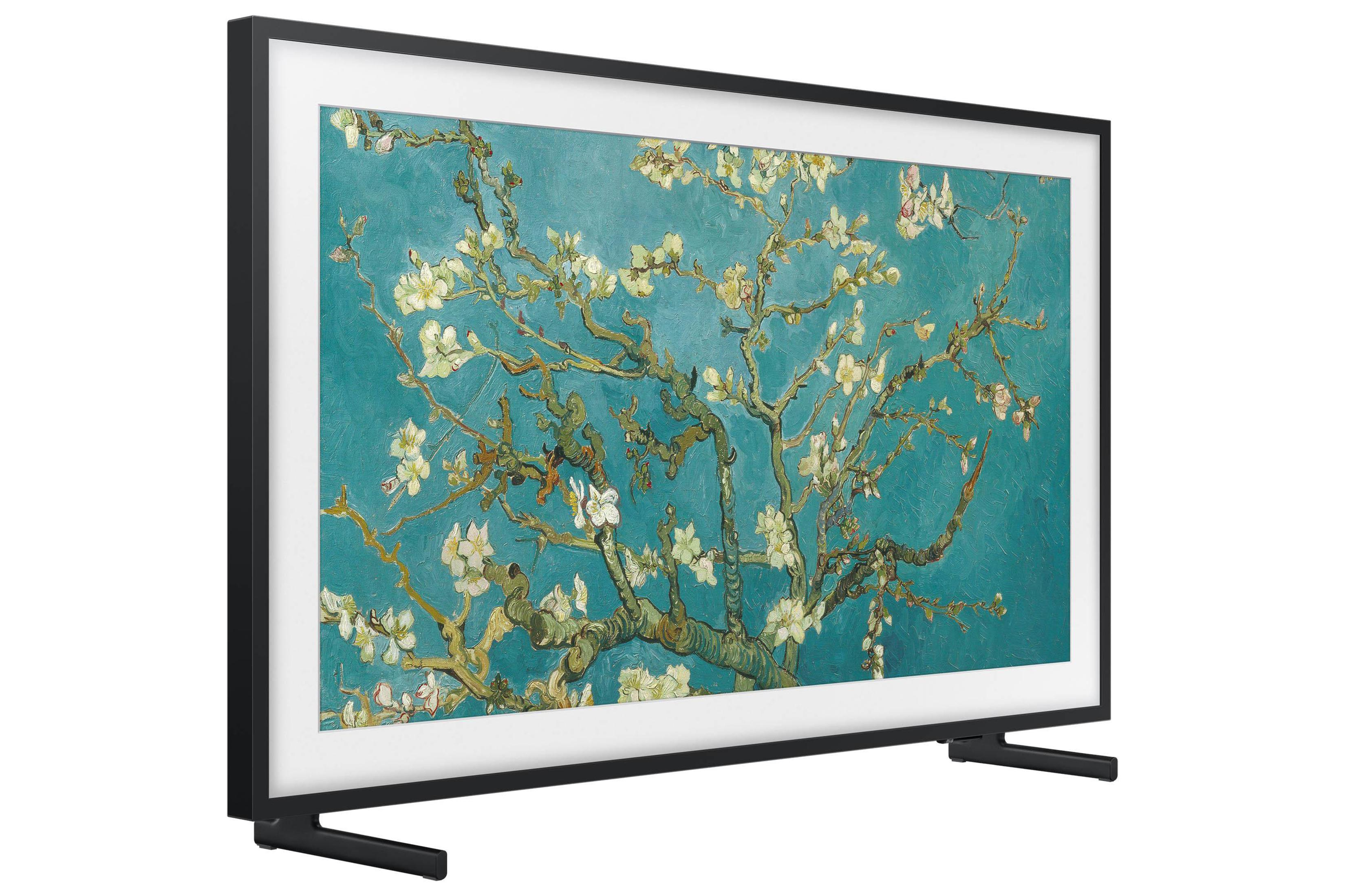 Czarny telewizor w ramie wyświetla obraz kwiatów migdałowca na turkusowym tle.