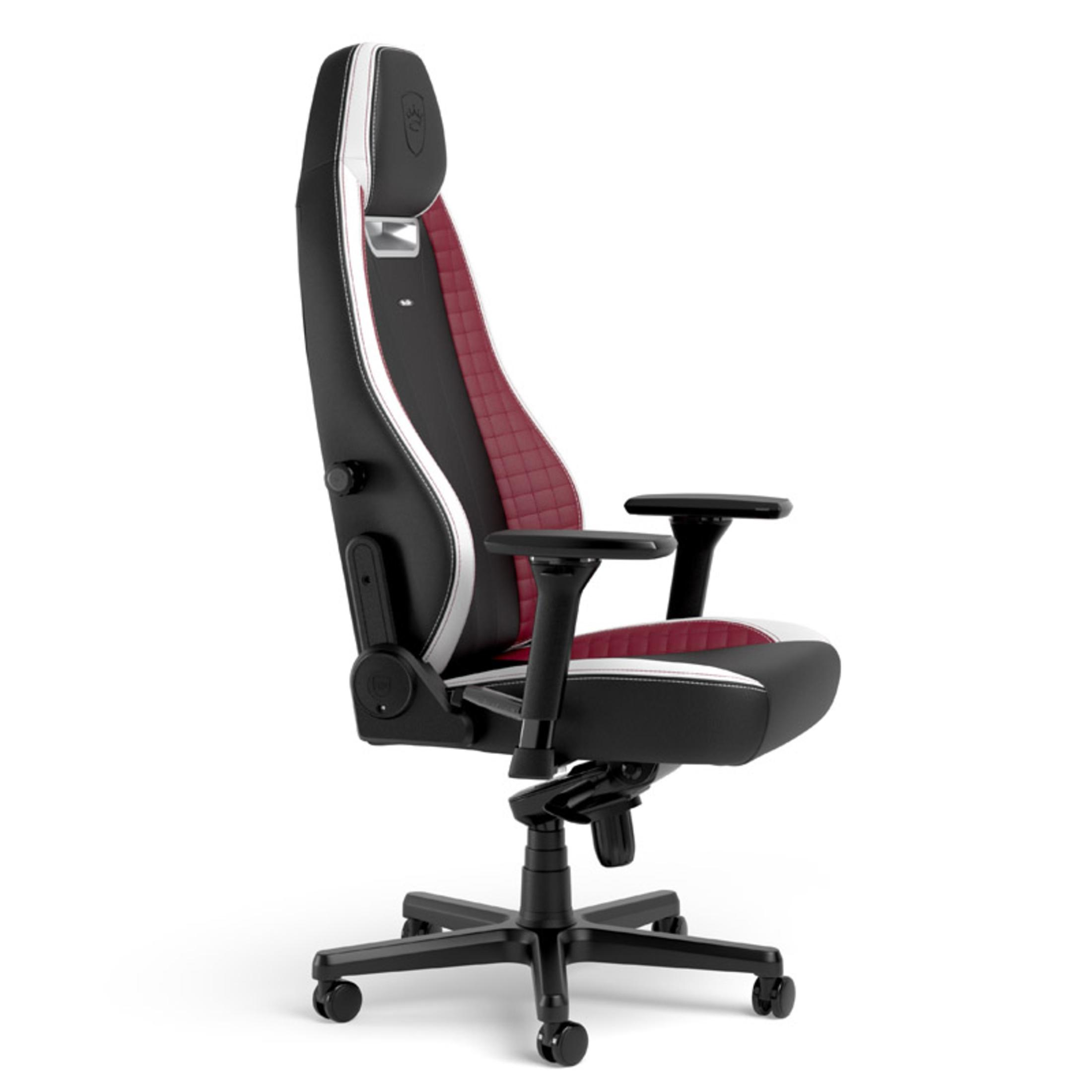 Gaming-Stuhl von der Seite. Er ist schwarz, weiß und rot, mit hohem Rücken, Armlehnen und schwarzem Gestell.