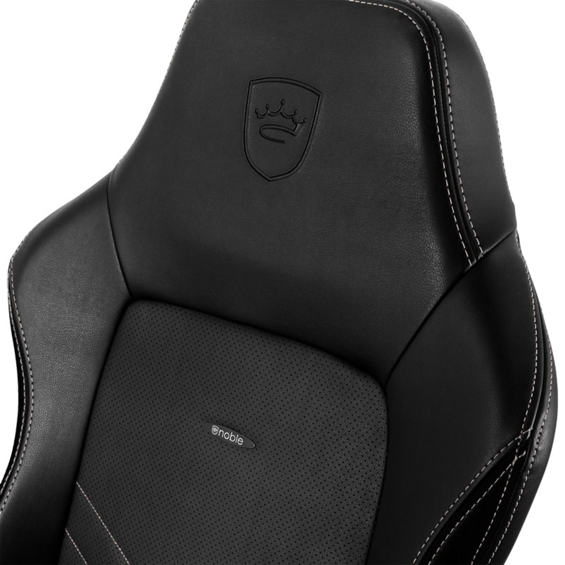 Poggiatesta per sedia da gaming in pelle nera con logo e cuciture bianche.