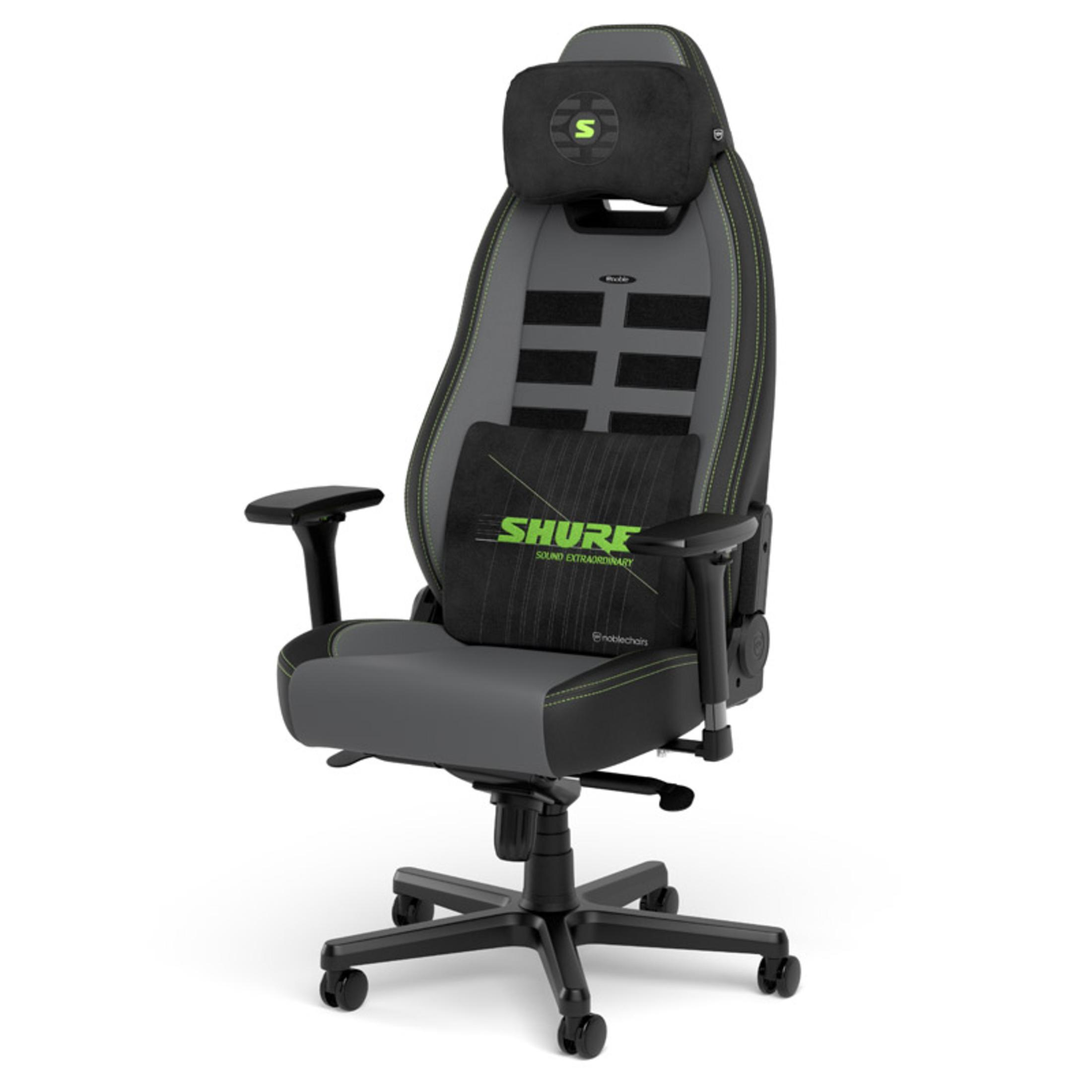 Gaming-Stuhl, grau und schwarz mit grünen Akzenten.