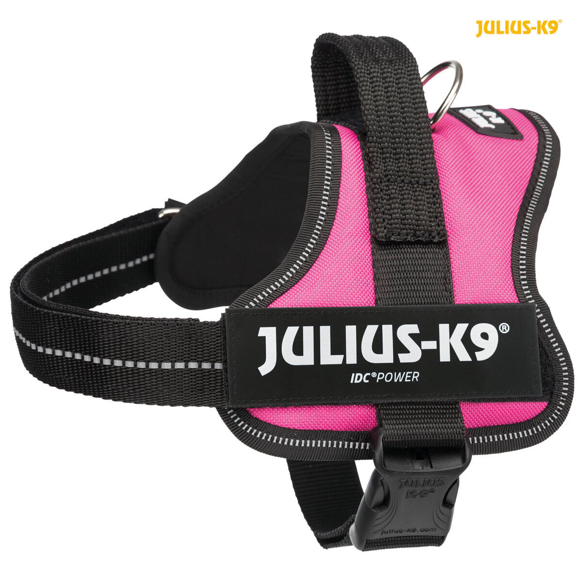 Un arnés para perros rosa y negro con el texto 'JULIUS-K9'.