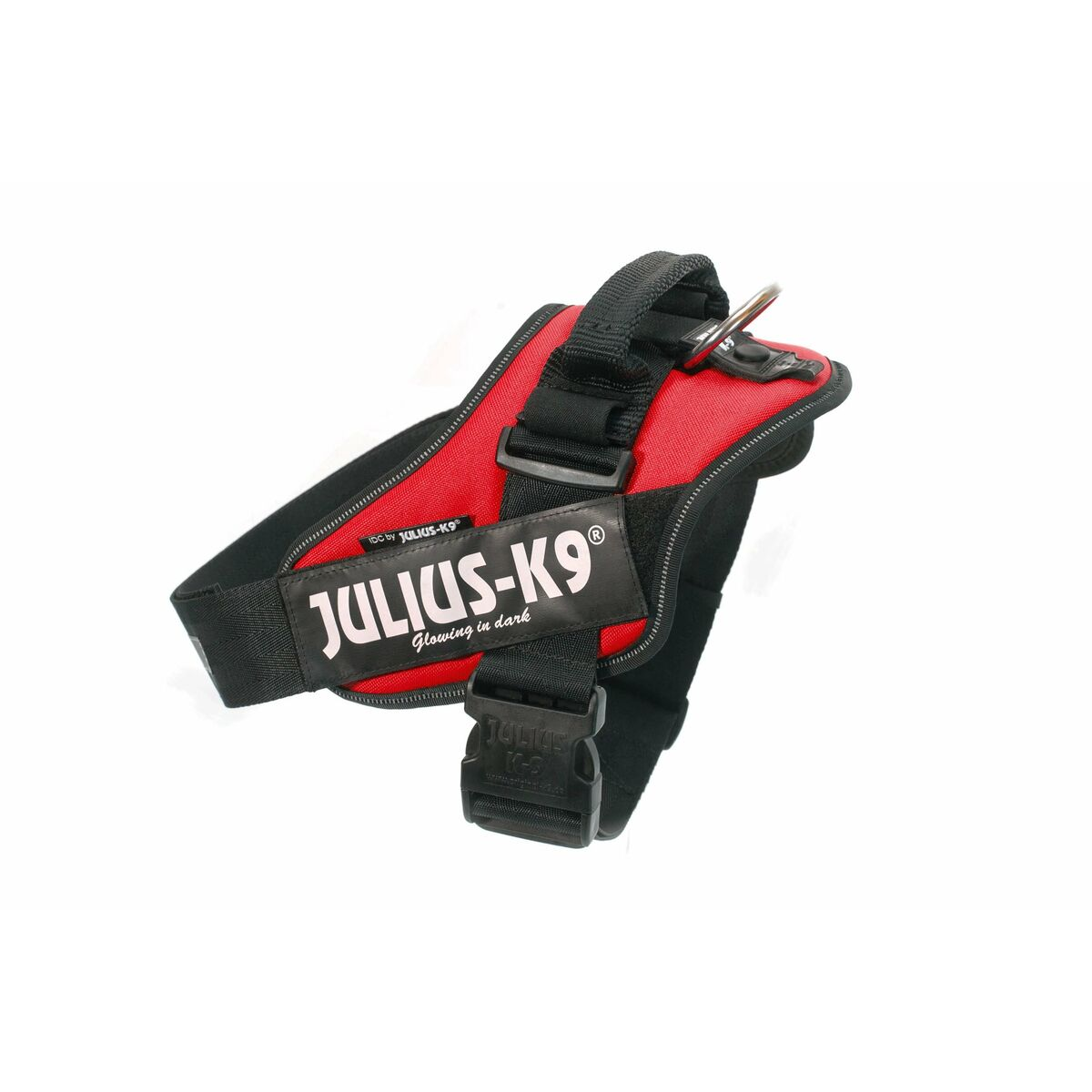 Rotes und schwarzes Hundegeschirr mit 'JULIUS-K9'-Logo, leuchtet im Dunkeln, auf weißem Hintergrund.