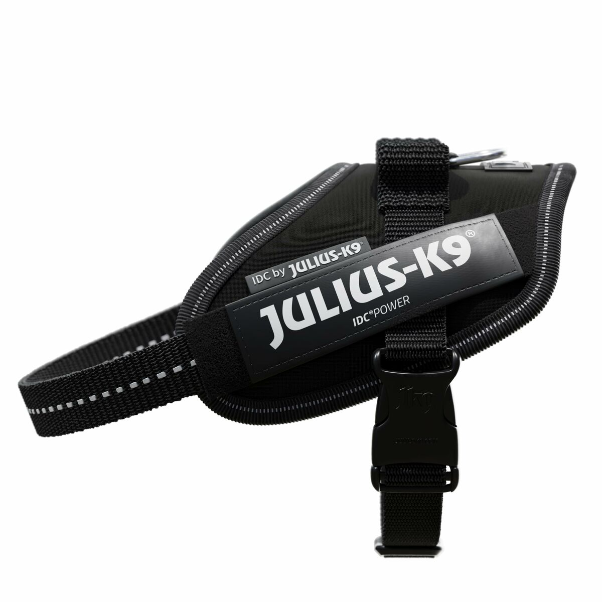 Arnés para perros en blanco y negro con el logo "JULIUS-K9" y bandas reflectantes.