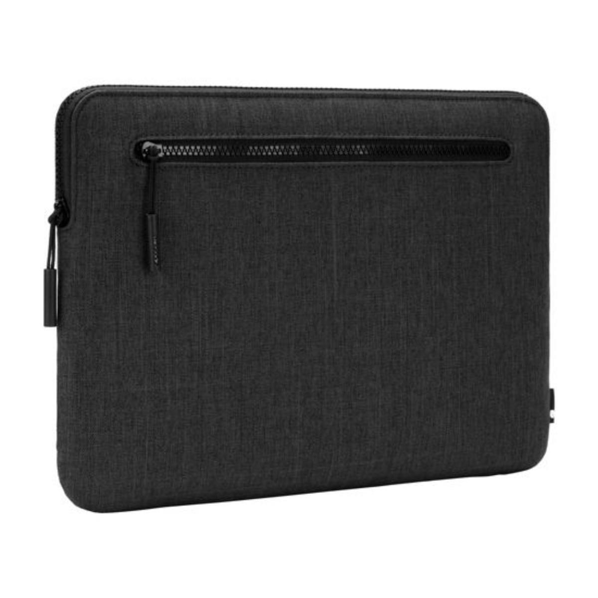 Custodia nera per laptop con chiusura a zip, design semplice ed elegante.
